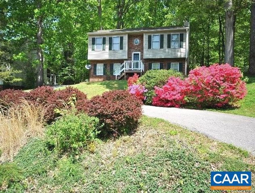 Open House Sunday 3-5pm More Pictures to Come. Welcome home to this delightful split-foyer gem in the sought-after Forest school district, offering 3 bedrooms (2 upstairs, 1 downstairs) and 2 full baths?all for under $290,000! Step inside to discover fresh, new flooring that brightens every room. Imagine mornings spent sipping coffee on the deck just off the kitchen, overlooking your private, fenced backyard adorned with mature trees. The spacious lower level boasts a cozy family room with a fireplace, perfect for movie nights or gatherings with loved ones. Outside, the circular driveway not only adds charm but also provides plenty of space for guests and all your outdoor toys. This is the perfect place to make memories?schedule your visit today!