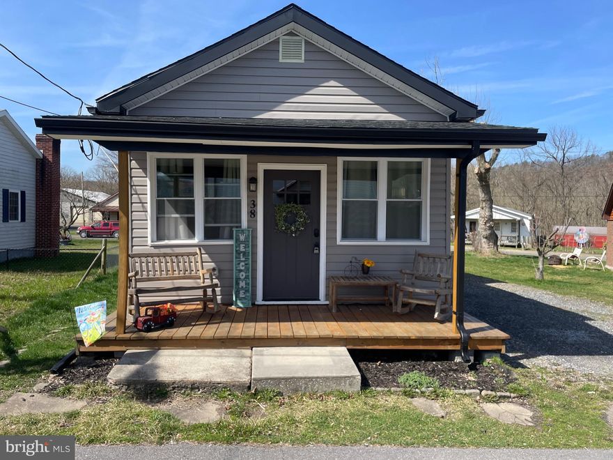 The cutest bungalow I have ever seen! Welcome 38 Amelia St. located in the quiet town of Paw Paw  West Virginia and just minutes to the C&O Canal Bike Path! This home is one of the original homes in the town built in 1920! And fully remodeled in 2022!  Currently this bungalow has been a successful Airbnb for those traveling the C&O Canal bike path! But would make a great full time residence! So if your looking for that small town community or a great investment property this adorable bungalow could be it! Call today! You do not want to miss you chance to own a little piece of history!