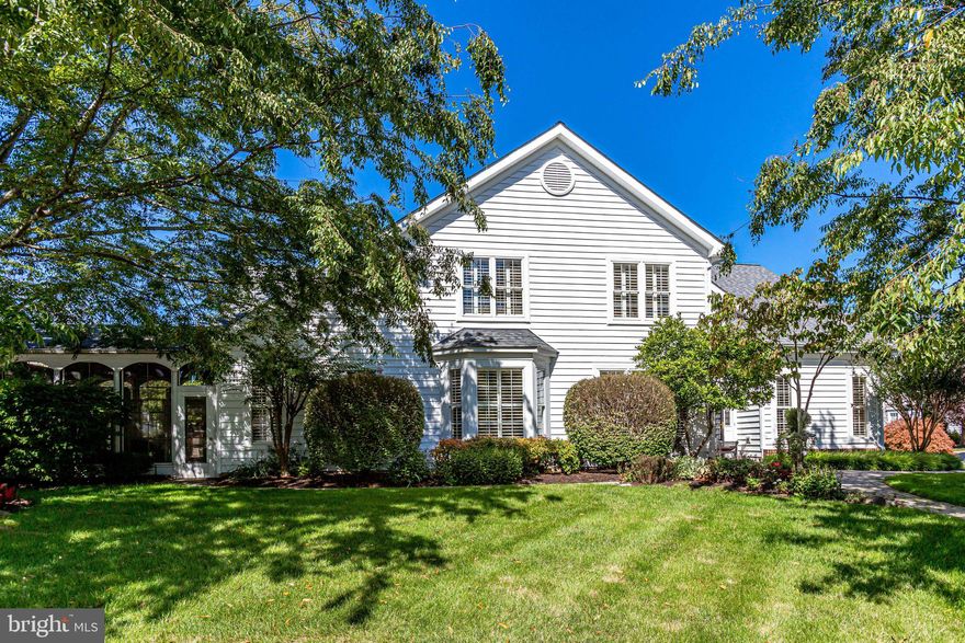 Don’t miss this opportunity to live in a sought-after neighborhood located in Heritage Hunt!
This elegant home features superior quality and craftsmanship. It is the Yardley Executive model in award winning Heritage Hunt Golf and Country Club. The most popular floor plan in the community!  Great flow for entertaining and everyday living.
Enjoy the open floor plan including a stately foyer, 3 bedrooms, loft, 2 full baths and 1 half bath. There is a beautiful formal living room and dining room drenched with natural light.  The kitchen features an island with new pendant lights, gorgeous countertops, designer subway tile and stainless steel appliances.   The kitchen opens to a breakfast room and family room with a custom gas fireplace.  This home includes a highly desirable first floor primary bedroom with a spa-like bathroom.  The 3-section stairway opens up the space and leads to the loft area with cathedral ceilings. From any room in the house, you will look out onto amazing gardens and mature trees.  The 3-season Sunroom is an absolute stunning room opening to an exquisite patio.  Across the street is a pastoral common area with benches offering a park-like setting. Other notable upgrades include crown molding, chair rails, rich hardwood floors, Transom windows, walk-in closets with custom built-ins, gorgeous professional landscaping, recessed lighting, heated marble flooring in the primary bath, ceiling fans, upgraded siding, irrigation system, leaf guard for gutters, Pella windows and wood Plantation shutters.
Shopping, medical facilities, entertainment, restaurants, and social services nearby!