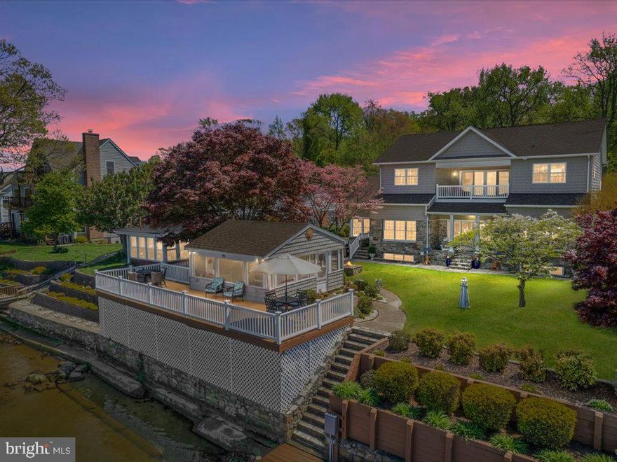 Showings to start on 4-24 and open house scheduled 4-27 from 11-2. If you are looking for a waterfront estate that boasts over 5100 finished sq ft of luxurious living space look no further this home will check all the boxes. Owner has taken meticulous care of this custom-built home that was fully renovated in 2011 with over 400k in renovations. This home is an entertainer's paradise that is loaded with amenities to impress the pickiest of buyers. From the moment you pull up to this waterfront estate you will notice the ample parking and will be wowed by the custom stone front facade. When you enter the home, you will appreciate the open concept with high ceilings enhanced by crown molding and the huge windows that will give you breath taking views of the highly desired bodkin creek. There is a huge family room off of the gourmet kitchen that you and your family will enjoy creating some gourmet meals in and will make your holiday gatherings a breeze to host. Off the kitchen there is a 3-season sunroom with more views of the beautiful bay The upper level is dedicated to the master suite with a beautiful spa like on suite huge walk-in closet that offers your private laundry area. There is a wonderful veranda off the master with awesome views of the bodkin to enjoy your morning coffee or sunset cocktails. Lower Level is laid out perfectly for hosting huge parties with the custom-built stone facade wet bar with plenty of TVS for your favorite sporting events as well as a billiards area and a cozy gas fireplace for those chilly evenings. Lower level also has a full bath with another laundry area and a walkout to the waterfront side of the home. The outside waterfront area is the party spot this area you will find a custom built screened in crab shack that is no ordinary crab shack. This outdoor bonus area offers a custom built in grilling area with a sink and refrigerator to keep the beverages cold. There is a huge gathering area with plenty of seating with built in surround sound system and outdoor TV. This is a awesome entertaining area. This home is located in the best spot on the bodkin as you can see right out to the bay and if you enjoy watching the huge ships including cruise ships go by you can do it right from your deck. If you're into boating and having fun on the water this home does not disappoint the huge pier with boat lifts, and jet ski lifts for all your personal watercraft toys. There is a custom-built covered boat house area to dock your boat under if you desire. On the weekends sit out on your second level decking area on your dock and enjoy all the boating and activities that go on in this part of the Bodkin. There are only so many waterfronts that go up for sale on the Bodkin and this is one of those homes that you just cannot replicate. This home will not last long on the market with the location and all the bells and whistles