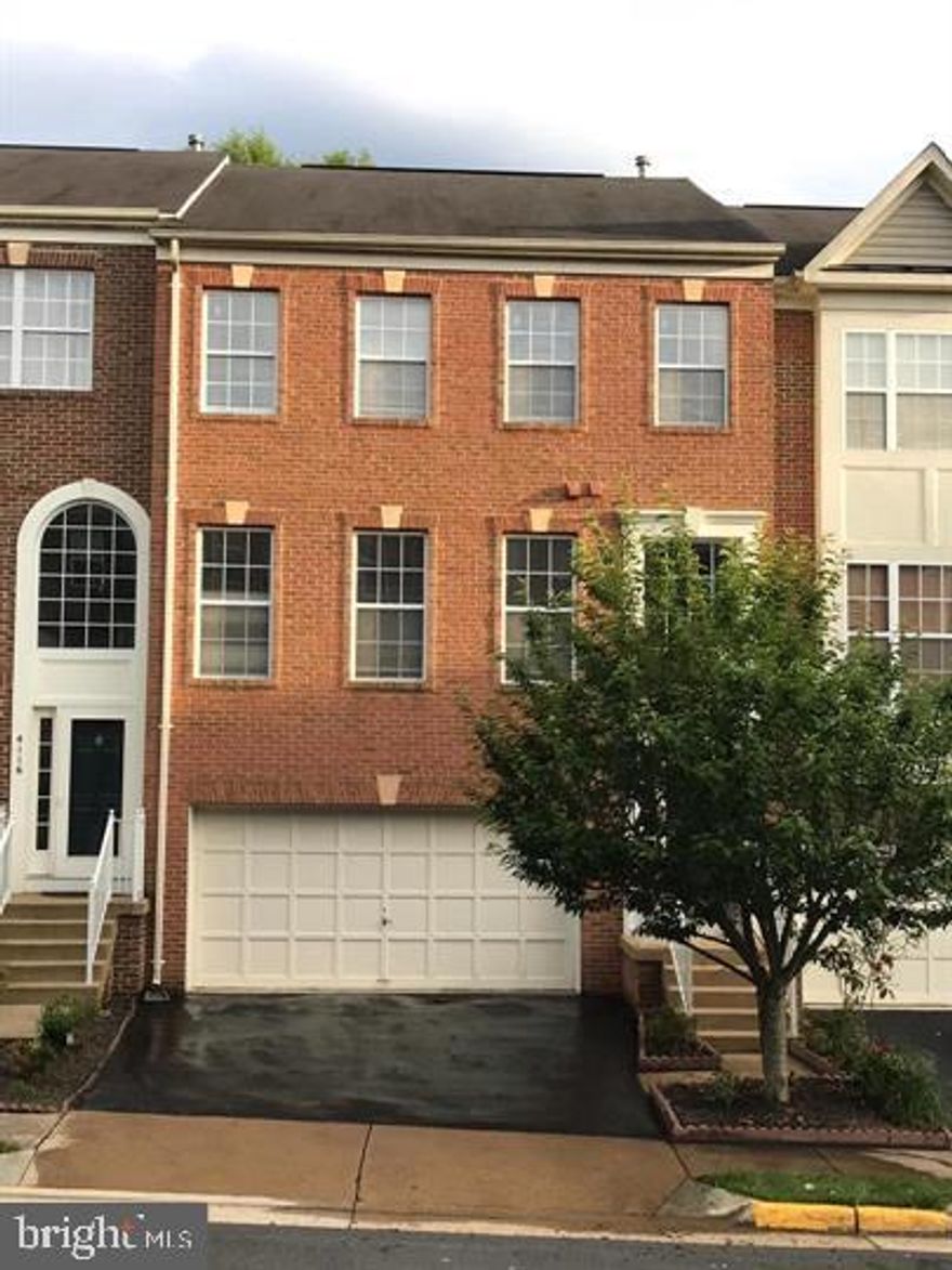 Beautiful spacious 3 level town home with lots of sunlight throughout the day. Newer carpet & paint throughout, Newer Stainless Steel Appliances. 3 spacious bedrooms upstairs with a large closets. Hardwood floors throughout the main level. Open kitchen with large island, 42" Cherrywood cabinets. Big private deck. Walkout basement with a fireplace lots of recessed lights. Spacious 2-car garage with lots of guest parking. Completely painted throughout with brand new carpets in the basement and upstairs. Great location with a short drive to Fairfax Lakes, Fairfax Corner, route 66, 50 and the FFX County Parkway. A short drive to Fairfax Corner, 66 and 15 mins from the Vienna Metro and 20 mins to DC. A MUST SEE HOME!