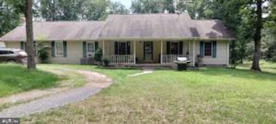 Spacious home in need of some TLC. Priced to sell on a beautiful 2.5 acres! Being sold as is.