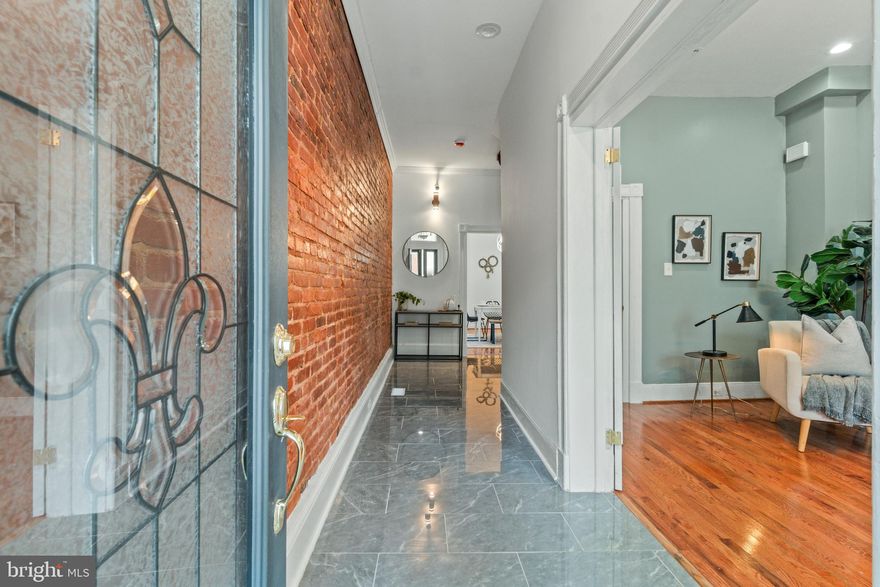 Home is where the heart is, and 918 Newington is your next home. This 3-story beauty is full of character with the right hints of modern accents; located in the sought after Reservoir Hill. As you enter your home, you will instantly notice the beautifully paired exposed brick with porcelain flooring in the main level’s hallway. Your home features 5 bedroom, 3 full baths and 2 half baths. In the back of the home off the kitchen is a deck that is perfect for outdoor living and a parking pad for your convenience. The basement has a laundry area with washer/dryer and a half bath. You’re close to MICA, Johns Hopkins University, the Maryland Zoo, Druid Hill Park and Charles Village. With easy access to I-83, you’re a quick trip to Downtown and Towson. Up to 100% Financing and Closing Cost Assistance Available towards the purchase of this home via seller's preferred lender. Reach out to Co-Listing Agent for details. Submit an undeniable offer and call this home yours!