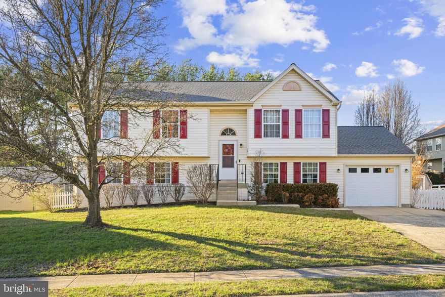 Beautifully updated and move-in ready, this spacious home offers 4 generously sized bedrooms and 3 full bathrooms, combining comfort, style, and functionality. Freshly painted throughout, the home features recently updated bathrooms and a warm, inviting layout designed for everyday living. The cozy wood-burning fireplace creates the perfect gathering space, adding charm and character. The kitchen is equipped with a new dishwasher and microwave, providing modern convenience for today’s lifestyle. Step outside to a brand-new Trex deck—ideal for entertaining or relaxing—overlooking a large, fully fenced yard with plenty of space to enjoy. Additional updates include a roof approximately 7 years old, offering added peace of mind. With ample room sizes and a flexible layout, this home easily accommodates a variety of needs. Perfectly situated near major commuting routes, shopping, and dining, this home delivers both convenience and comfort. A true turnkey opportunity—schedule your showing today!