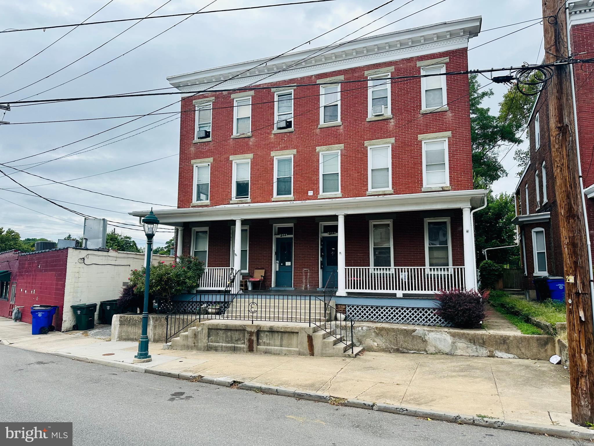 Great positive cashflow investment opportunity! Well maintained 6 unit apartment building not far from beautiful City Park, Meritus Park, University of Maryland Hagerstown Campus, Barbara Ingram School of the Arts, Maryland Theatre, restaurants and more! This building is fully occupied and produces approximately $4,700 a month in income! Natural gas radiant heat! Each unit is 1 bedroom and 1 bathroom. Large backyard, detached garage. The owner will consider holding owner financing. Owner is also selling 419 Summit Ave with 5 units.