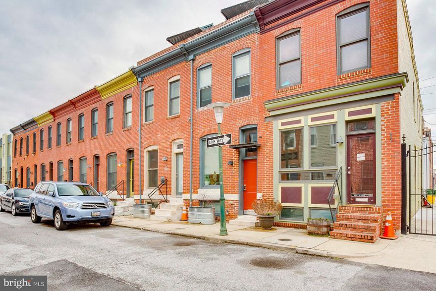 Price Reduced to Sell!!! Well maintained 3BD, 3BA Row Home with 4 Levels, Providing over 1,900 Finished Sq  Ft that is Beautifully Maintained.  Features: Gated Alley with a Parking Pad; Master Bedroom with Full Master Bath and Sitting Area that exits to Deck;  Stainless  Steel Appliance; Granite Counter tops; Tank Less Hot Water Heater; Concrete Stained Floors in Basement; Hardwood Floor Throughout; Close to Patterson Park.