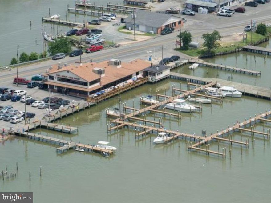 Offered for sale is a rare and exceptional waterfront property featuring a well-established restaurant with over six decades of successful operation and marina on Neale Sound directly off the Wicomico and Potomac Rivers in Charles County. This iconic destination boasts an approximately 8,712-square-foot restaurant building with inviting outdoor waterfront dining, a convenience store, and a take-out area, plus on-site fuel pumps serving both vehicles and boats.

The marina offers over 40 slips equipped for daily and overnight docking, many with electric and water hookups. The property holds valuable licenses permitting on-sale and off-sale beer, wine, and spirits, as well as Maryland Lottery sales, providing diverse and robust income streams. The business also maintains a massive digital footprint with almost fifty thousand Facebook followers, ensuring immediate reach for the next owner.

The purchase price includes the real property, marina, business, and all furniture and fixtures. The business will be sold under a separate contract from the real property.

Strategically located just a short drive from the Washington, D.C. metropolitan area and Northern Virginia, this property benefits from steady marina traffic, seasonal visitors, and a loyal customer base drawn by its storied history and unmatched waterfront appeal.

This opportunity is ideal for an owner-operator or investor seeking a prestigious waterfront hospitality asset with proven profitability and strong growth potential.
