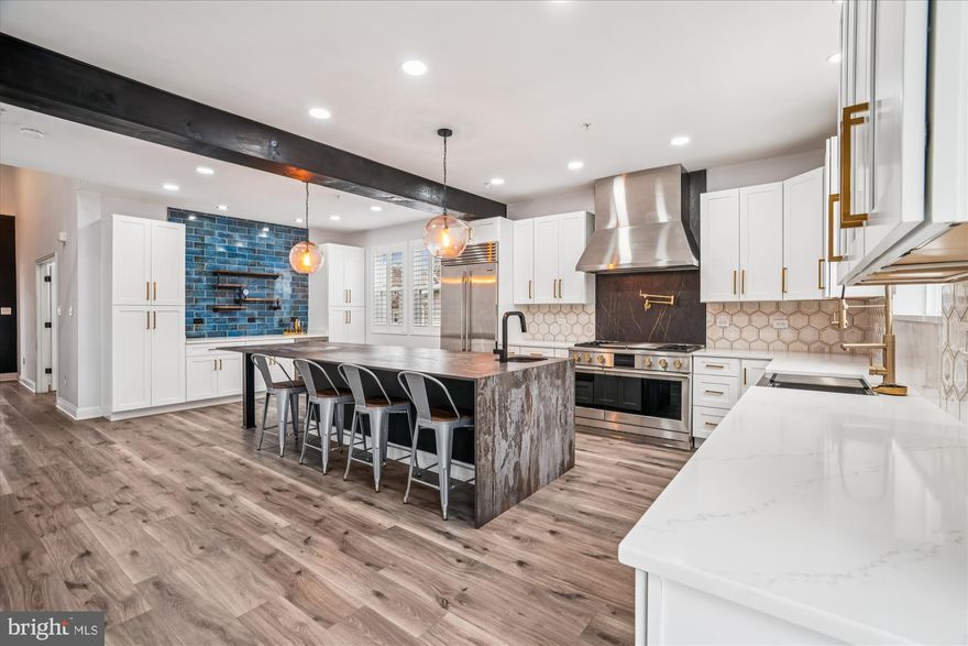 Located on a quiet cul-de-sac in Waldorf, this beautifully upgraded 5-bedroom, 3 full and 1 half bath home offers the space buyers need and the high-end finishes they rarely find at this price point. Just 10 years young, the home has been thoughtfully elevated beyond builder-grade. Most notably with a stunning chef’s kitchen renovation featuring quartz countertops, custom cabinetry, a Monogram range, Sub-Zero refrigerator, and an oversized island topped with Dekton. Designed for gathering, entertaining, and everyday living, this kitchen truly sets the home apart. New LVP flooring enhances the main living areas, while updated baths provide a fresh, modern feel throughout. Upstairs, the spacious primary suite offers a comfortable retreat, and the additional bedrooms allow flexibility for guests, work-from-home space, or multigenerational living. The finished lower level creates an ideal recreation space — perfect for movie nights, game tables, fitness, or hobbies. Outdoor living includes a rear deck and screened patio, extending your entertaining space year-round. Leased solar panels convey with the property and may help offset a portion of monthly electric usage. 
This home offers the upgrades buyers want — without the wait or premium of new construction.
Schedule your private tour and see the difference in person.