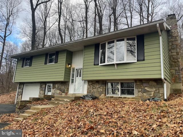 A perfect blend of comfort, style and functionality, step into this beautifully remodeled home located in Exeter Township and situated on a tranquil and generous .75 acre lot. From the moment you enter, you’ll appreciate the attention to detail and high-quality finishes throughout-starting with a spacious living room, a central area for relaxation and socializing. Off the living room you will find a beautiful updated/remodeled kitchen/dining area, which both plenty of cabinet space for all your storage needs, along with all new appliances. The main level also includes 3 bedrooms and 2 full baths. Additional living space in the lower level rec room with pellet stove, provides an ideal space for relaxing and entertaining. In addition, there is a separate laundry room and a powder room for your convenience. The property also includes one car garage.
Convenient location provides easy access to local parks, shopping centers, major drive highways and dining options. A 1 year home warranty will be provided to the buyer with an acceptable agreement of sale. Schedule your showing today as you don’t want to miss the opportunity to own this move-in ready home which provides a nice blend of convenience yet rural escape.