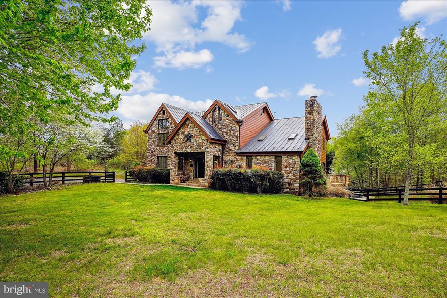 With fresh renovations, this 5,000+ square foot custom built home on 35 private acres includes 6 bedrooms, 4 baths, a salt water pool and hot tub, loads of natural light, metal roof, and high end finishes.  Recent updates include the primary and secondary bathrooms, kitchen updates, new appliances, long lasting engineered wood siding, and white oak hardwoods. This home has year-round appeal to all lifestyles; one can both entertain or enjoy quiet weekends by the pool and hot tub, working in the shop with radiant heat floor infrastructure, or simply relaxing by the firepit in this nature filled sanctuary.   The updated kitchen, expansive views and inviting wood burning fireplaces add welcoming warmth to the home, and a large basement complete with a guest suite provides easy access and privacy for guests.  Additional features of the finished basement include a wet bar, full pool table, fireplace, bathroom, bedroom, and walk-out access to the pool and hot tub.  Upstairs, enjoy your morning coffee or nighttime beverage of choice on the balcony directly off of the primary suite. With Starlink and a cell booster conveying, both the benefits and features of this property are too much to list.  Come see for yourself!  No HOA or other restrictions. Property qualifies for forestry land use tax deduction!
Other features and benefits include:
Kitchen: large walk-in pantry, wine fridge, separate coffee bar area, plenty of cabinet storage
Library/office with custom built-in shelving
Primary Suite: two spacious walk-in closets with custom shelving, soaking tub, sauna
Cathedral ceilings throughout: foyer, family room, primary bedroom, primary bath
Upper and lower decks, large patio
Beautiful stone exterior
Serene rolling fenced pasture
Energy efficient 2x6 framing with R19 wall insulation
LED lighting throughout
Mature hardwood trees with several natural springs and streams on property
1500 square foot (30x50x10h) detached garage/ workshop with radiant floor heating hookup and a seperate 200 amp electrical service.
One exterior house camera is on the premises.