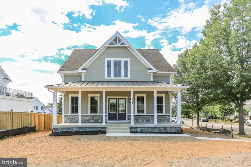 BRAND NEW CONSTRUCTION IN THE CITY OF FREDERICKSBURG. CONVENIENT WALKING DISTANCE TO ALL THAT FREDERICKSBURG HAS TO OFFER. INVITING FULL LENGTH FRONT PORCH WITH ADDED DEPTH FOR THE COMFORT OF LARGER PORCH FURNITURE. FIRST FLOOR FEATURES A STUNNING STUDY/OFFICE WITH MOLDINGS FLOOR TO CEILING. LARGE FIRST FLOOR BEDROOM WITH EN SUITE BATH AND WALK-IN CLOSET. GOURMET KITCHEN WITH 36" GAS COOKTOP, BUILT-IN OVEN/MICROWAVE COMBO, AND A MASSIVE ISLAND PERFECT FOR ENTERTAINING. CUSTOM BUILT-INS SURROUND THE FIREPLACE IN THE FAMILY ROOM THAT IS OPEN TO THE KITCHEN. THE FORMAL DINING ROOM W/CROWN MOLDING IS OPEN AND EASILY ACCESSIBLE TO THE KITCHEN. 

THE BASEMENT IS PARTIALLY FINISHED WITH A HUGE FULL WIDTH RECREATION ROOM THAT INCLUDES AMPLE NATURAL LIGHT AND A STUNNING WET BAR W/DARK LEATHERED GRANITE TOPS AND AN UNDER COUNTER BEVERAGE COOLER. BASEMENT ALSO  FEATURES A FULL BATHROOM, EXCERCISE ROOM, MECHANICAL ROOM, AND A LARGE STORAGE ROOM. WALKOUT STAIRS ALLOW FOR EASY ACCESS TO THE REAR YARD.

THE OPEN RAIL STAIRCASE LEADS TO THE SECOND FLOOR LOFT THAT WOULD BE PERFECT FOR A SECONDARY FAMILY ROOM. TWO LARGE GUEST BEDROOMS WITH LARGE WALK-IN CLOSETS AND A FULL HALL BATHROOM W/DUAL VANITY. THE PRIMARY BEDROOM HAS TONS OF NATURAL LIGHT WITH A TRIPLE WINDOW UNIT. THE MASTER BEDROOM ALSO FEATURES TWO WALK-IN CLOSETS, EN SUITE BATH W/DUAL VANITY, HUGE SHOWER, AND A PRIVATE COMMODE ROOM.