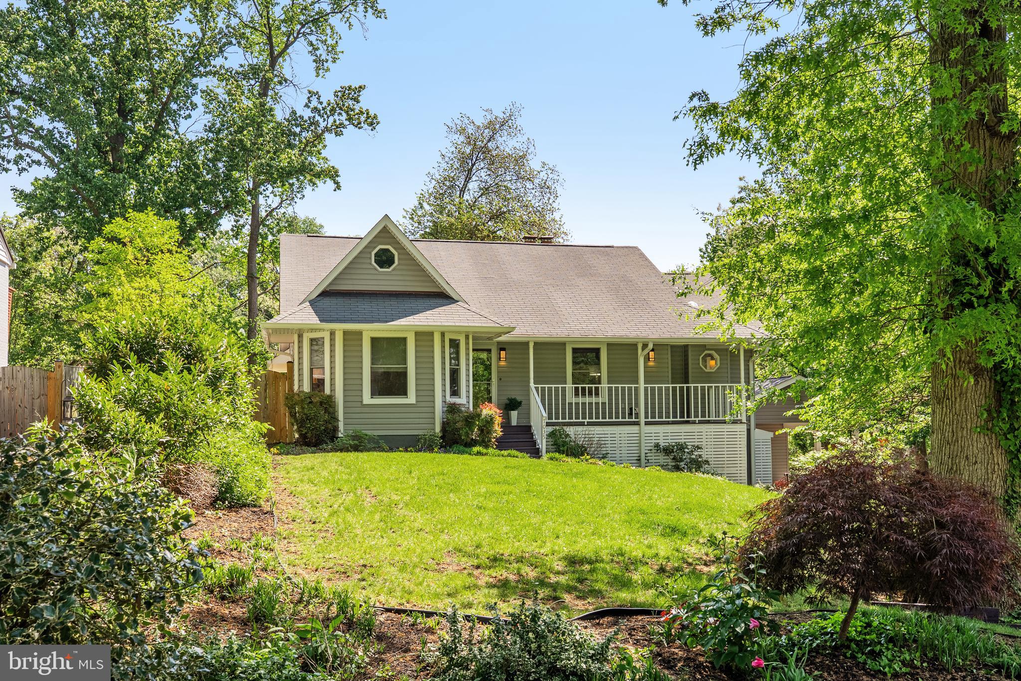 Tucked away on a quiet dead-end street, 7035 Swain Dr. is a 4-bedroom, 2.5-bathroom oversized bungalow set on an impressive 0.44-acre lot, offering privacy, space, and serenity. With no formal HOA and a community-oriented neighborhood, this home is a rare find in the heart of Alexandria, VA.
Entering through a charming front porch, step inside to discover an inviting main living area with cathedral ceilings and an abundance of natural light. A wood-burning fireplace anchors the space, creating a warm and cozy atmosphere. A gracious loft space, accessed by a spiral staircase, offers incredible flexibility; perfect as a bedroom, office, library, craft room, or secondary living space. There is a primary en-suite on the main living level and two additional bedrooms and a full beautifully updated shared hall bath.
The updated eat-in kitchen features soft-close custom cabinetry, pull-out drawers, Corian countertops, and an octagonal dining nook, all designed for effortless functionality. The large back deck and lower-level concrete patio provide ample space for gracious outdoor entertaining.
The fully finished lower level was recently remodeled to include a spacious fourth bedroom with a new walk-in closet, additional recessed lighting, fresh paint, and a stylish new laundry room with custom cabinetry, countertops, and under-cabinet lighting. A second fireplace makes the lower level a cozy retreat. A standout feature of the home is a recently built 2-car carport, complete with a finished bonus room—ideal for a studio, home office, or gym.
Recent Upgrades & Improvements
This home has been thoughtfully upgraded over the years, including:
2024: Custom-built 2-car carport with an insulated room added behind the carport, perfect for a studio or home gym.
2025: Whole-house interior paint, laundry room remodel, basement renovation, recessed lighting, new outlets & switches, master bath updates, and deck improvements
2024: New whole-house water softener system
2023: New custom stairwell window for additional natural light
2022: New Bosch dishwasher, new LG washer/dryer, and new exterior doors
2021: New roof-mounted solar attic fan, backyard storage shed, new flooring in kitchen, solar tubes for natural light
2018–2020: Upgraded gutters, master bath vanity & lighting, and front deck improvements
2015: Kitchen refresh with new cabinetry, hardware, countertops, and crown molding
The oversized lot provides a large backyard, perfect for gardening, pets, and play. The cathedral ceilings, two fireplaces, and cozy bedrooms create an inviting ambiance, while multiple entertainment spaces—both indoors and out—make hosting a dream.
With its expansive lot, unique layout, fresh updates, and fantastic location near both urban conveniences and nature escapes, this property offers both charm and versatility—a perfect place to call home.
Perfectly positioned for commuters, 7035 Swain is located just minutes from Old Town Alexandria, the Pentagon, Huntington Metro, Washington, D.C., Fort Belvoir, and effortless access to major commuter routes, including 495, the Wilson Bridge, and the GW Parkway, while being just moments from the scenic trails and wetlands of Huntley Meadows Park. The Groveton Civic Association fosters a friendly, engaged community, with neighbors who take pride in their homes and love to gather outside in warm weather.
Welcome home!