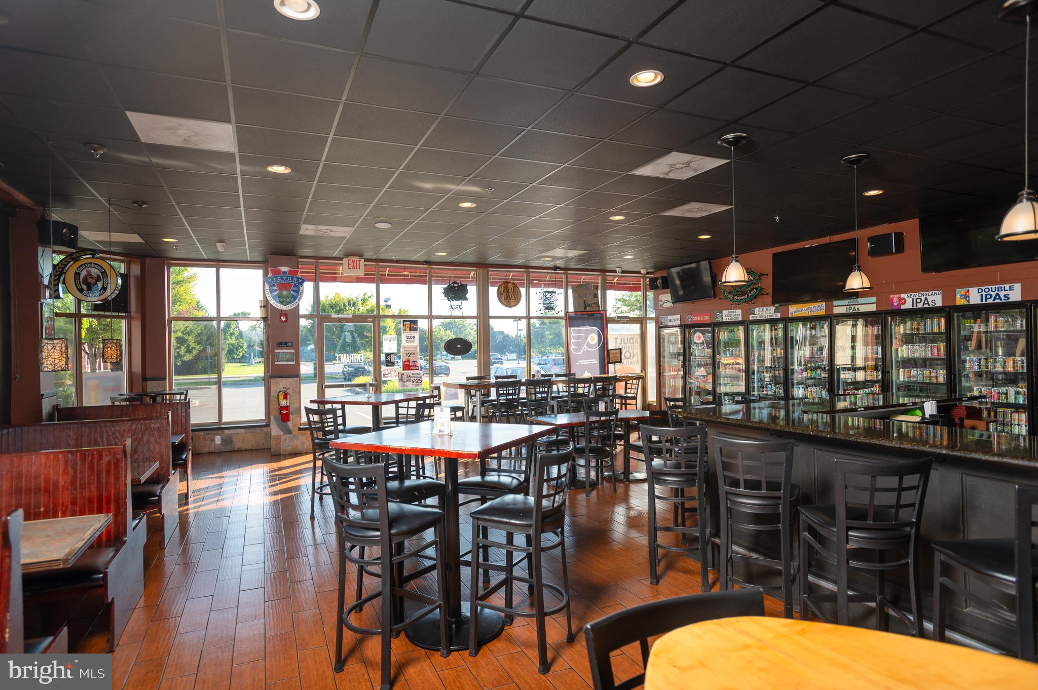 This family-owned, pub-style pizzeria business for over 20+ plus years is ready to be handed over to a new family/owner. EXTREMELY! clean facility throughout. All the equipment and systems have been maintained thoroughly throughout the years. The business is in a very high-traffic location and the area in which it surrounds is growing every day. The building offers 3,863 square feet of indoor space with plenty of natural lighting and an additional 726 square feet of outdoor space. The outdoor space was added in March of 2018. The restaurant bar seats over 20 individuals, with a full serviced bar, 20 beers on tap, adult slushies and over 250 beers in the custom-built coolers. The indoor restaurant seating offers 5 booths, 21 tables and 72 chairs. The outdoor seating offers 7+ tables & chairs with umbrellas. Plenty of televisions for all your sporting entertainment needs along with trivia night and live music performances. The fully equipped kitchen has 2 gas, pizza ovens, gas stove, flat cooktop, fryers, mixers, large prep area, stainless steel walk-in freezer, plenty of storage and shelving and the list goes on and on. State of the art POS system, alarm & camera system, ample parking. Take the time and come and look at this great opportunity in a very sought after location.
