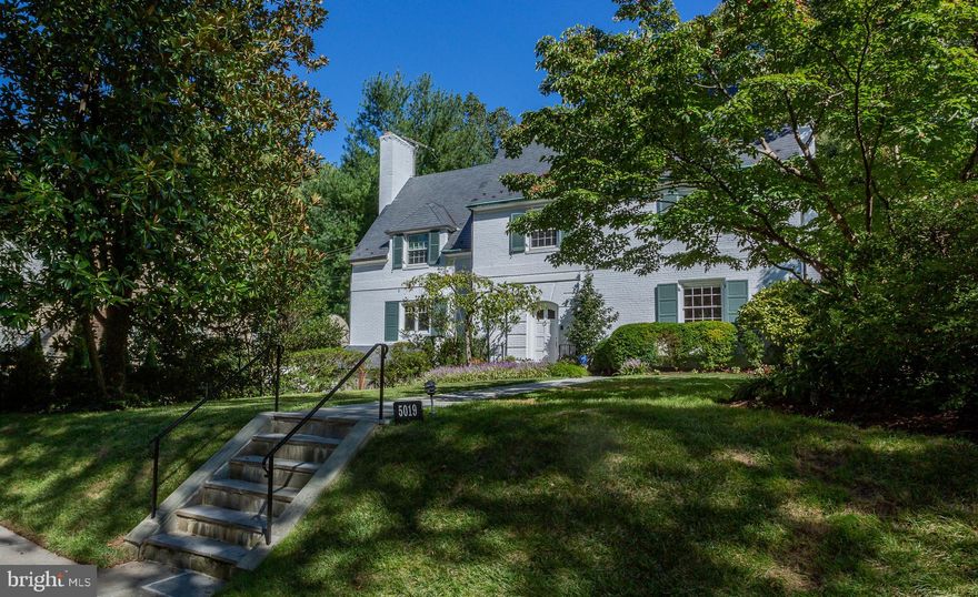 JUST LISTED! FOREST HILLS URBAN OASIS WITH HEATED POOL & SPA! Set far back from the street on tranquil Linnean Ave, this handsome brick Colonial reveals an expansive, airy interior with extra spacious, sun-drenched rooms and serene, leafy views throughout! An entertainer's dream, on the main level grand-scale formal LR & DR, Chef's Kit, & Family room flow seamlessly together and out to the private BACKYARD PARADISE with heated pool, spa, and waterfall surrounded by mature trees and lush plantings! Upstairs is a spacious owner suite with dressing room and en suite bath plus four additional xl bedrooms and two additional full baths. Finished LL with nanny suite w/ full bath, large fam/rec room with fireplace, laundry/storage. 2-car attached garage w/ mud room plus additional driveway parking!