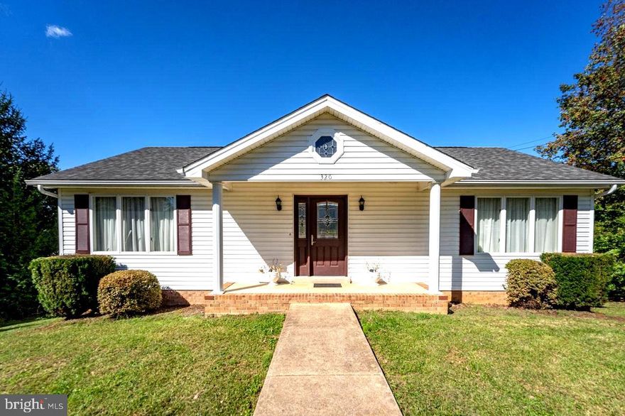 Charming, impeccably maintained 3-bedroom home in the heart of Luray! Nestled on two generously sized lots, this home offers the perfect blend of small-town charm and spacious living with no HOA! Boasting three sizeable bedrooms and two full and one-half bathrooms, this home is the perfect size for relaxing and entertaining. The main level greets you with an open kitchen featuring an eat-in area perfect for casual meals. A convenient half bathroom is located just off the kitchen. The well laid out flow of this home continues into a formal dining room and an open concept living room, ideal for year-round gatherings. The two expansive bedrooms on this level share a full bathroom. The lower level expands the home’s living space with an open entertainment area, an additional bedroom, and another full bathroom. The laundry area is also conveniently located on the lower level. Step outside to enjoy a deck with mountain views, mature landscaping, off street parking, and three separate sheds offering extensive storage and workshop potential. The expansive double lots provide privacy and space for your furry friends, all within the desirable Town of Luray—just minutes from Luray Elementary School and Luray Middle School, shops, restaurants, and the Hawksbill Greenway. Do not miss the chance to make this beautiful home your own!