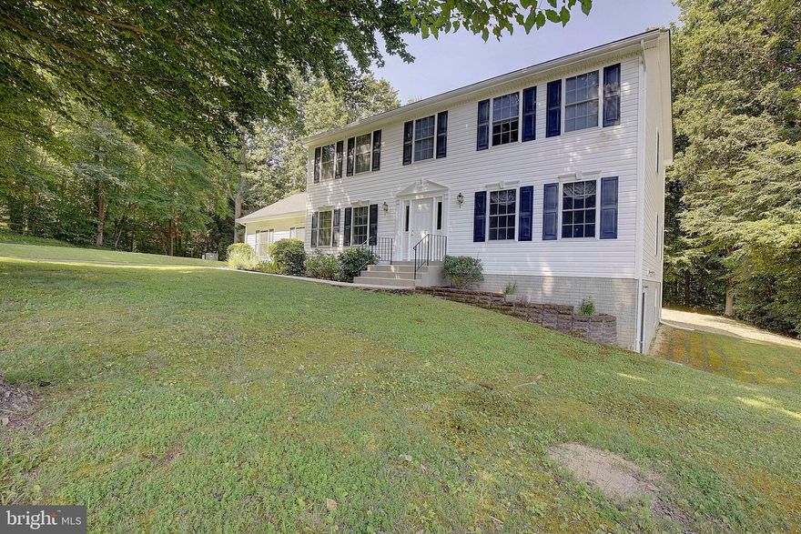 Fabulous Huntingtown location with almost 2 acres  of privacy! Original owners have updated all of the important things over time such as;  a new roof and gutter guards in 2021 and new dual zone HVAC units in 2017!  Has a brand new septic system ( June 2025).  Backyard is fresh with seed and straw! Priced right for you to update cosmetic features leisurely and as you wish ---without paying for them in a 30 yr mortgage! Home has an abundance of space with a separate dining room, living room, and family room off the kitchen. The eat-in kitchen is generously sized with an island and table space. Sellers just installed a new stainless steel dishwasher, stove and range hood (June 2025).   Has four large bedrooms upstairs, and the sewing/craft room in the finished basement could easily serve as a 5th bedroom. The spacious primary en suite has a walk-in closet and a primary bath with a soaking tub, separate shower and a double vanity.  This three-level colonial has extra room in the walk out basement with a large rec room and laundry. The 1.94 acre lot offers plenty of privacy and backs to woods. You'll love the cul-de-sac and no HOA fees! Located in area of top rated schools including Huntingtown High, but also close to Prince Frederick shopping, grocery stores, movie theatre, restaurants and hospital.  Easy commute is within an hour of Washington, DC, Saint Mary's County and Anne Arundel County/Annapolis.