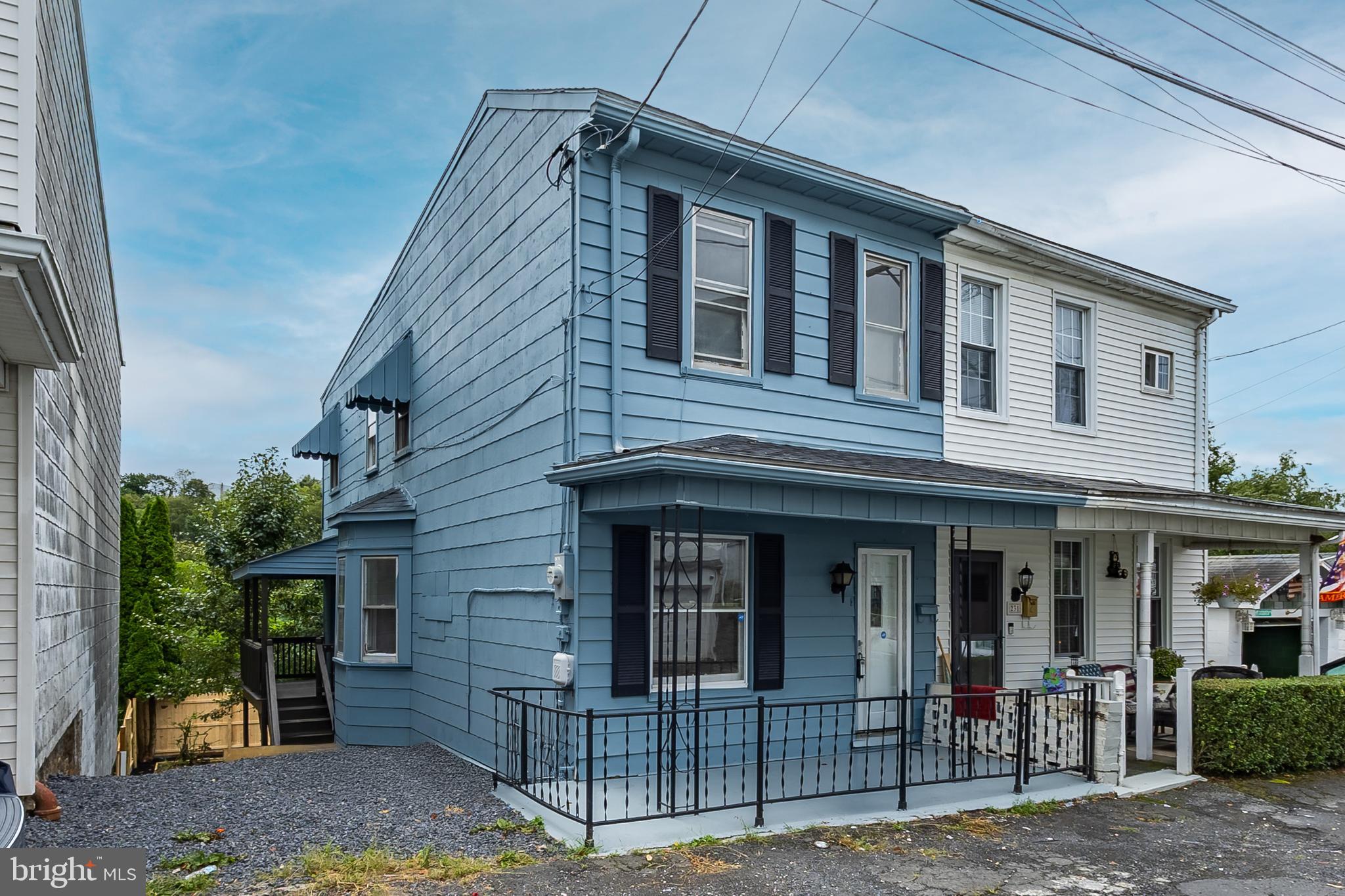 Welcome to 229 Wallace Street, Pottsville! This three-bedroom home has been recently updated with modern improvements, making it comfortable and move-in ready. The property now offers a new roof, freshly painted exterior and basement, and new flooring in the living room.
The kitchen has been fully remodeled with granite countertops and new appliances. Additional upgrades include new laundry and water heater plumbing, a new water heater, and warranties on the oven, refrigerator, and roof for added peace of mind. The bathroom was completely redone, including a beautifully tiled shower. An open-concept first floor provides a bright and functional layout, complemented by a newly fenced backyard (yard is bigger then fenced in area!) that’s ideal for outdoor enjoyment. The deck and patio area were also reconstructed, too. A newly added parking pad also offers the convenience of off-street parking. With its many updates, this home is a great choice for a new owner or as an investment property. Schedule your private showing today! Photos by Michala Reber Photography