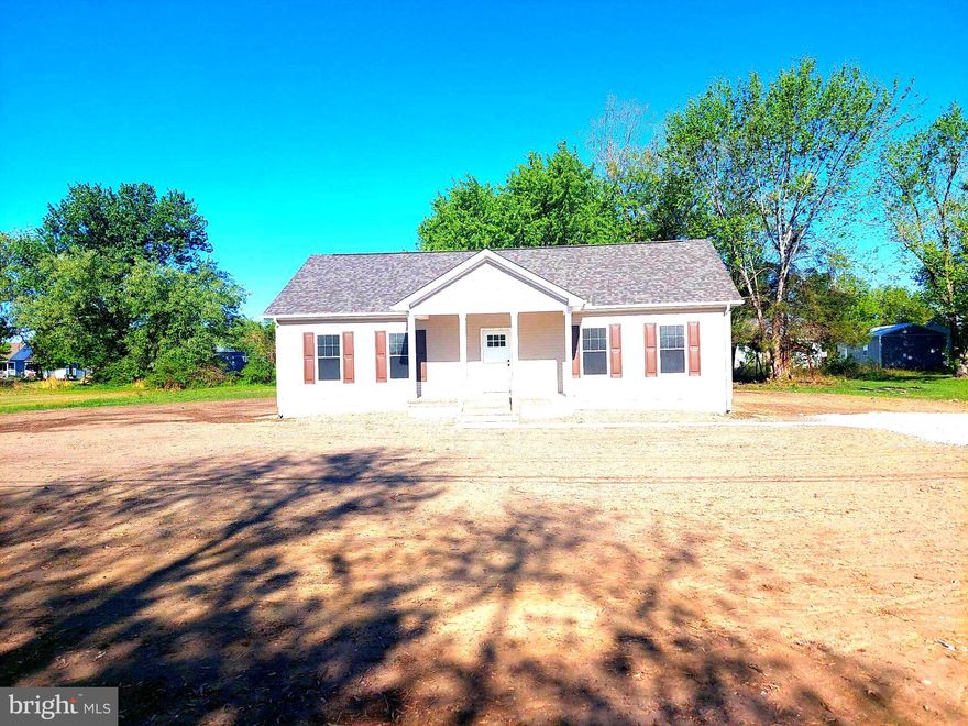 Nestled in the serene community of East New Market, this exquisite new construction home is poised to redefine luxury living. This stunning ranch-style residence offers a unique opportunity to personalize your dream home while enjoying the high-end features that await. Spanning an impressive 1,344 square feet, this thoughtfully designed layout encompasses three spacious bedrooms and two full bathrooms, providing ample space for relaxation and comfort. The architectural style embraces a modern ranch aesthetic, seamlessly blending elegance with functionality. Crafted with premium materials, including blown-in insulation and durable vinyl siding, this home promises both beauty and efficiency. As you step inside, envision the warm and inviting atmosphere that will soon envelop you. The open-concept design allows for effortless flow between living spaces, perfect for entertaining or enjoying quiet evenings at home. Large windows will invite natural light to dance throughout the interiors, creating a bright and airy ambiance that enhances the sense of tranquility. The expansive lot, nearly one acre in size, offers a canvas for outdoor living. Imagine creating your own private oasis, complete with lush landscaping, a serene garden, or a charming patio for al fresco dining. The possibilities are endless, allowing you to curate an outdoor space that reflects your personal style. Parking is a breeze with a convenient driveway, ensuring that you and your guests have easy access to your luxurious retreat. While the property does not feature a pool, the expansive yard provides ample room for future enhancements, should you desire to add a splash of leisure to your lifestyle. Located in the desirable East New Market community, this home offers a peaceful escape while remaining close to essential amenities. Experience the perfect blend of luxury and comfort in a setting that encourages a relaxed, upscale lifestyle. This is more than just a house; it's an opportunity to create a home that embodies your vision of elegance and sophistication. Don't miss your chance to be part of this exclusive community and make this stunning property your own. Embrace the luxury of new construction and the promise of a lifestyle that awaits you. The home construction is complete.