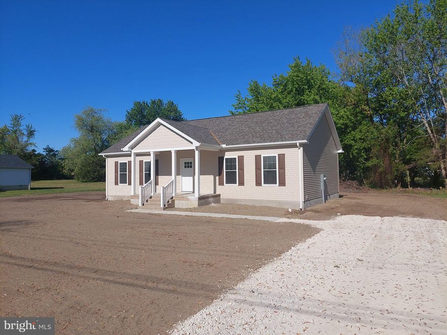 Nestled in the serene community of East New Market, this exquisite new construction home is poised to redefine luxury living. This stunning ranch-style residence offers a unique opportunity to personalize your dream home while enjoying the high-end features that await. Spanning an impressive 1,344 square feet, this thoughtfully designed layout encompasses three spacious bedrooms and two full bathrooms, providing ample space for relaxation and comfort. The architectural style embraces a modern ranch aesthetic, seamlessly blending elegance with functionality. Crafted with premium materials, including blown-in insulation and durable vinyl siding, this home promises both beauty and efficiency. As you step inside, envision the warm and inviting atmosphere that will soon envelop you. The open-concept design allows for effortless flow between living spaces, perfect for entertaining or enjoying quiet evenings at home. Large windows will invite natural light to dance throughout the interiors, creating a bright and airy ambiance that enhances the sense of tranquility. The expansive lot, nearly one acre in size, offers a canvas for outdoor living. Imagine creating your own private oasis, complete with lush landscaping, a serene garden, or a charming patio for al fresco dining. The possibilities are endless, allowing you to curate an outdoor space that reflects your personal style. Parking is a breeze with a convenient driveway, ensuring that you and your guests have easy access to your luxurious retreat. While the property does not feature a pool, the expansive yard provides ample room for future enhancements, should you desire to add a splash of leisure to your lifestyle. Located in the desirable East New Market community, this home offers a peaceful escape while remaining close to essential amenities. Experience the perfect blend of luxury and comfort in a setting that encourages a relaxed, upscale lifestyle. This is more than just a house; it's an opportunity to create a home that embodies your vision of elegance and sophistication. Don't miss your chance to be part of this exclusive community and make this stunning property your own. Embrace the luxury of new construction and the promise of a lifestyle that awaits you. The home construction is complete.