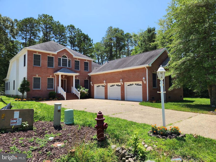 Check out this custom built home by T&G builders located in the Sanctuary of Ocean Pines. Large, almost 5000 square foot home with lots of thought put into the design and layout. Primary bedroom and full bathroom on each floor, two-sided gas fireplace creates an amazing ambience, large deck off the back overlooking the stream and equipped with a full bathroom making those crab feasts an easy cleanup. The house is adorned with hardwood floors, kitchen has granite countertops and stainless appliances, cathedral ceiling in the living area, large bedrooms, loft area, walk in closets, and views of the water from many windows. You can also store all of your cars and toys in the attached, 3 car garage. You have to see this one in person to truly see all it has to offer.