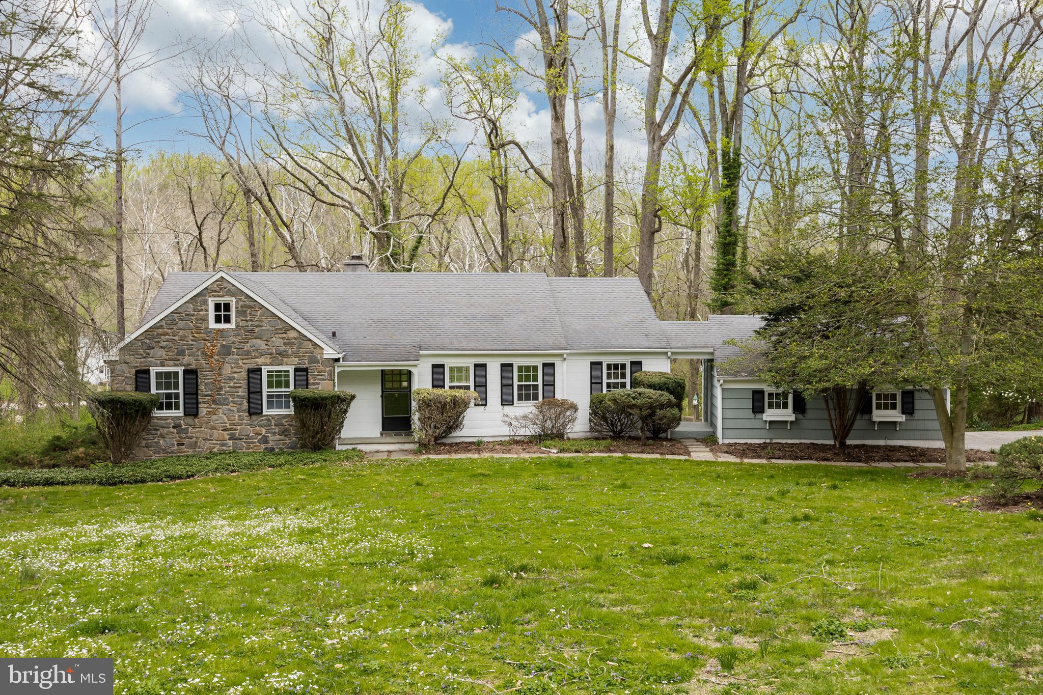 Welcome to the home of your dreams! This 3 bedroom, 3 bath ranch home sits on almost 1.5 acres of land in Newtown Square and boasts over 2600 interior square feet of living space. Situated on a quiet cul de sac overlooking woods and a stream this beauty is ready for you to use your imagination as you update it into your forever home.  On the main level you will find hardwood floors throughout. The open floor plan of this brightly lit home is perfect for entertaining. Enjoy the wall of windows in the great room as you sit in front of the wood burning fireplace or gather in the adjoining dining room. 

The Cozy kitchen with  knotty pine cabinets opens to a second story deck overlooking a serene backyard. You will find an additional two bedrooms each with their own full bathroom on this main level. Access to the lower level is granted via the kitchen or also in the bedroom hallway. The sunlit lower level boast a 3rd bedroom and another full bathroom, an enormous great room with a wood-burning fireplace, wet bar, hobby room, storage room and access to the backyard patio. Don’t miss your opportunity to finish the attic and make this into a true Cape Cod style home. Steps to the attic are off of the front foyer. Completing this home is a two car side entrance garage. Upper deck awning is being stored at Sereni & CO. Don’t waste time, schedule your appointment today!