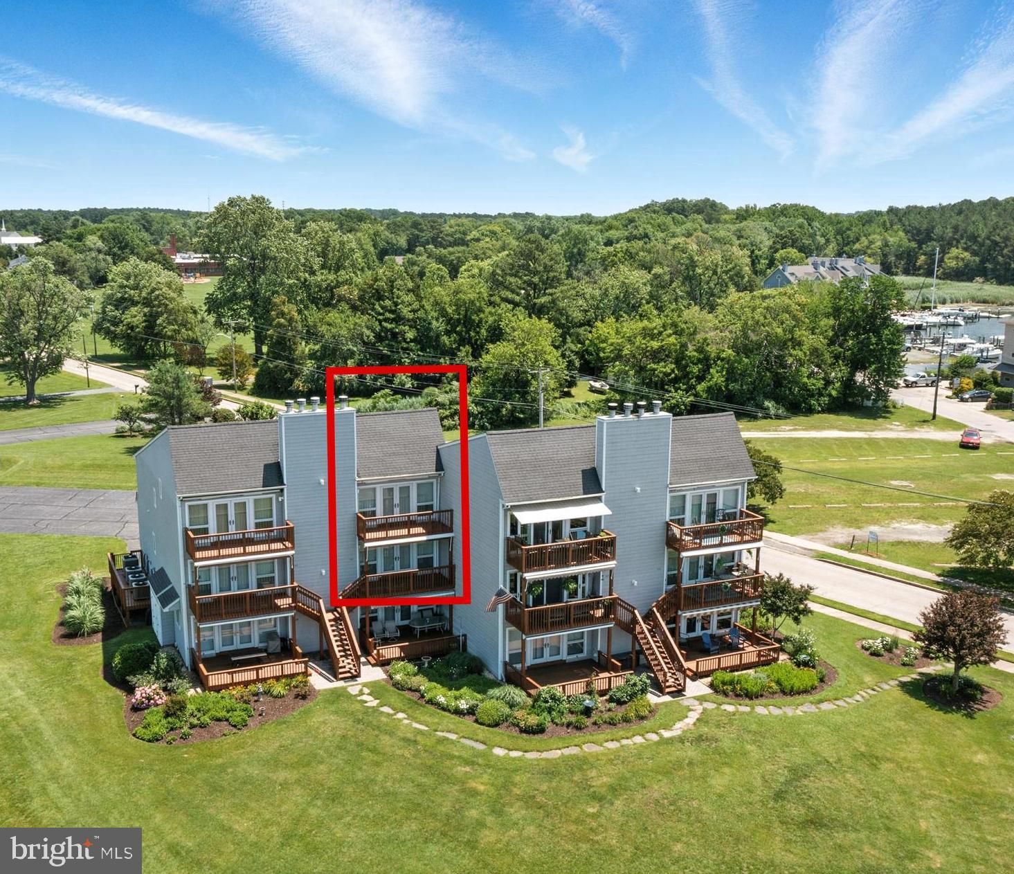 Experience the allure of waterfront living with this stunning condominium, perfectly situated to offer breathtaking views of the Chesapeake Bay and the Rock Hall Harbor. Inside, you are greeted by an inviting ambiance, accentuated by updated kitchen and flooring that seamlessly blend style and functionality. Whether you’re an aspiring chef or simply enjoy the art of entertaining, the modern kitchen is designed to inspire culinary creativity, boasting stainless steel appliances and ample storage space.
Just up the stairs you will find two large guest bedrooms, washer and dryer, and a full bathroom. The primary bedroom is located on the third level with a view of the Bay. You'll love the large private balcony overlooking the Chesapeake. The primary bathroom has a soaking tub as well as a shower, and a walk-in closet with ample space for storage.
This residence is located a short stroll from marinas, a vibrant array of restaurants, and downtown shops. Easy access to festivals throughout the summer and fall, enjoy a delightful day out or a cozy evening at your favorite eatery. The charm of this location is not just limited to daytime adventures; it transforms into a magical setting at night! The best part is the unobstructed views of spectacular 4th of July fireworks, all from the comfort of your own home.
This condominium offers relaxation and convenience while taking in all the charms of Rock Hall. With a focus on comfort, every corner is thoughtfully designed to cater to your needs, blending modern amenities with the natural beauty of its surroundings.
Don’t miss the opportunity to make this beautiful condominium your own! Embrace the coastal lifestyle and let the Chesapeake Bay become your new escape.