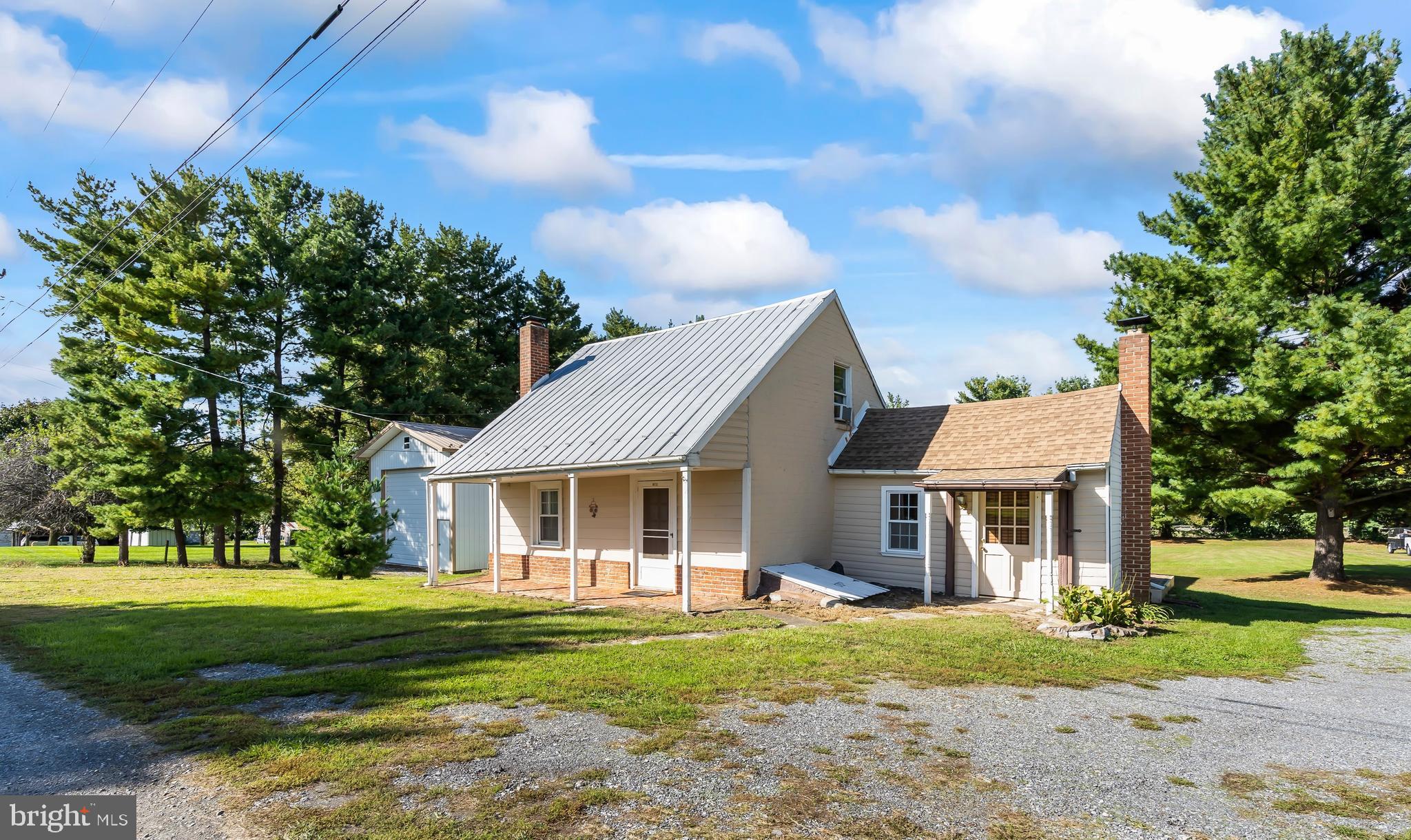 NEW PRICE!! On this HOBBIEST'S DREAM HOME, perfect home for someone who wants space between neighbors and has a hobby!! With the versatility of an oversized garage, the possibilities are endless. This space can be tailored for woodworking, auto mechanics, and even for running a home-based business all while offering the potential for keeping chickens or livestock with some quick fencing modifications.
Appointment only listing!! Location, Location, Location!! Come home to Boonsboro, MD to this home hosting 4 bedrooms, 2 full baths and updated kitchen all sitting on 1.10 acres. Home is constructed with hand hewn log in the front and a newer addition in the back. The front room with beautiful, rustic large plank wood floors, is the original cabin can be used as a bedroom or an extra family/game room. Kitchen has been is updated with new cabinets and granite counter tops, 1 bedroom is upstairs with full bath hosting a clawfoot soaking tub and the addition host 2 bedrooms, a full bath, large family room with slider to the outside patio and laundry. Outside you will find a great lot with beautiful views of the South Mountain offering stunning sunrises, lot is flat offering great potential for activities for the kids playing or gardening. You will also find a small barn (24x24)as well as a large pole barn( 26x40) with room for a woodshop, garage for 6 +cars, high ceilings for a potential lift. Don't miss this opportunity!