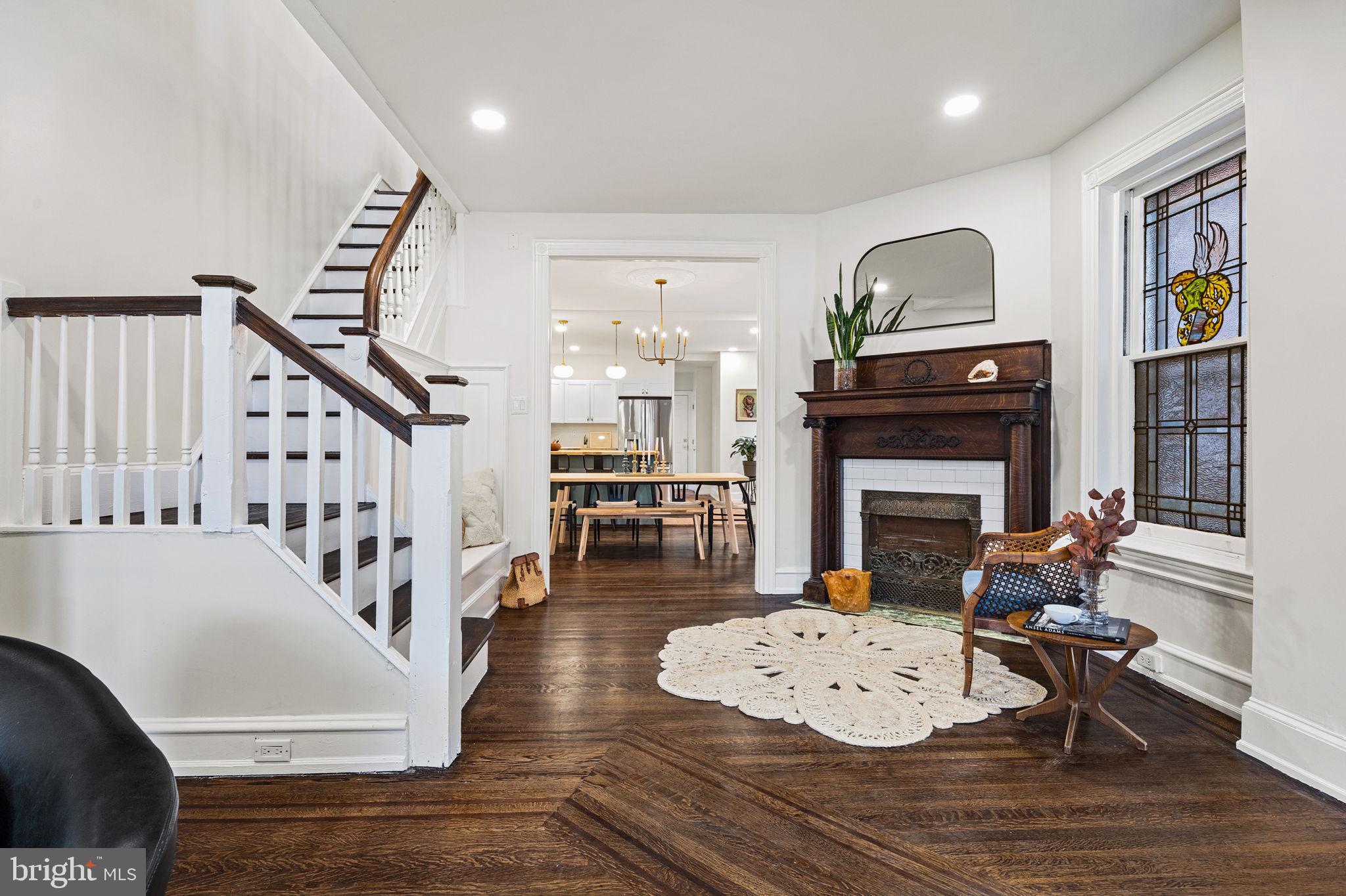 Charming West Philly Home with Original Details and Abundant Light!
Step into a piece of West Philadelphia history with this stunning 4-bedroom, 2-bathroom home brimming with character and flooded with natural light from 17 windows. Every corner of this residence tells a story, with lovingly preserved original details including hardwood floors, intricate trim, leaded glass windows, two beautiful fireplace mantels, and a vintage built-in wardrobe closet.
The main level offers an expansive layout anchored by a very large kitchen and dining area, complete with a peninsula island, built-in microwave, and plenty of space to gather or create. The sweeping living space include two areas perfect for curling up with a book or having a movie night. Off of the kitchen is your first full bathroom. Upstairs, the four spacious bedrooms provide comfort and flexibility and is where you will find your second full bathroom with double vanity.
A fully finished basement adds valuable living space and includes a washer and dryer for ultimate convenience. Enjoy morning coffee on the inviting front porch or unwind in the cozy backyard, perfect for a bit of greenery or small outdoor gatherings.
This home blends historic craftsmanship with modern function—perfect for anyone looking to plant roots in one of Philadelphia’s most vibrant neighborhoods.