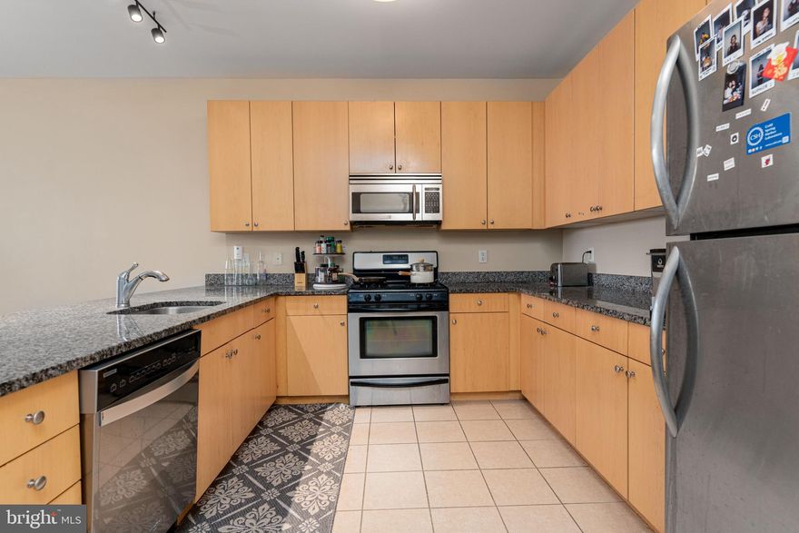 Welcome to The Village Lofts! Located directly across the street from Johns Hopkins University! Unit 422 is one of the largest units in the building and offers flexible living options! This rarely-available top floor corner unit has two massive bedrooms and a bonus den that can be used as an extra bedroom, office or living space. Seller has a signed a lease effective 6/1/24 - 5/31/25.