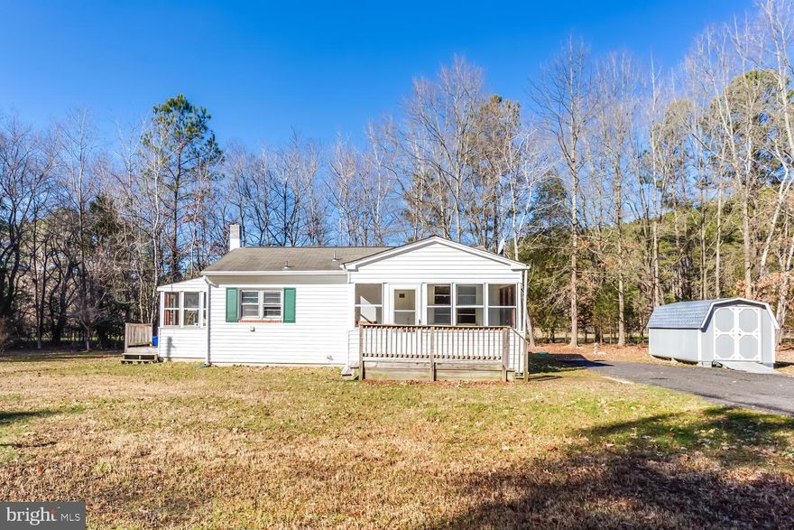 Adorable 3 bedroom home situated on 1.77 acres.  Fresh paint and new flooring throughout.  Full bath has been updated.  All new windows being installed approximately 1/25/21.  New Mitsubishi  wall mount with heat pump being installed January 2021.  Side porch could easily be converted into a separate laundry room.  Large front enclosed porch to enjoy the quiet surroundings. This property includes  Tax ID 05012511 and Tax ID 05033438.