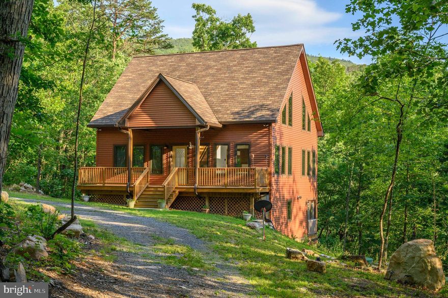 Welcome home!!!  Custom, Quality Built 2017 Cabin, barely lived in; shows like a NEW HOME.  Move-in ready!!  Includes LOT 6, a second 4.1 acre track for a total of  8 acres on 2 TRACKS of land. Perfect situation for short term rental (current daily rentals $ 200/night, double that amount by building on LOT 6), weekend getaway/second residence or make this your primary residence.  Winter views currently but removing a few trees could give one glorious southwest view year round (see aerial pics). Convenient location close to Route 211; 10 mins New Market & I 81, 15 Mins Luray.  Half-way up Massanutten Mountain between Mount Jackson & New Market.  Enjoy everything that  Central Shenandoah Valley has to offer: hiking, fishing, river rafting, caverns, wineries/breweries and horseback riding.   Subdivision backs to George Washington National Forest.
