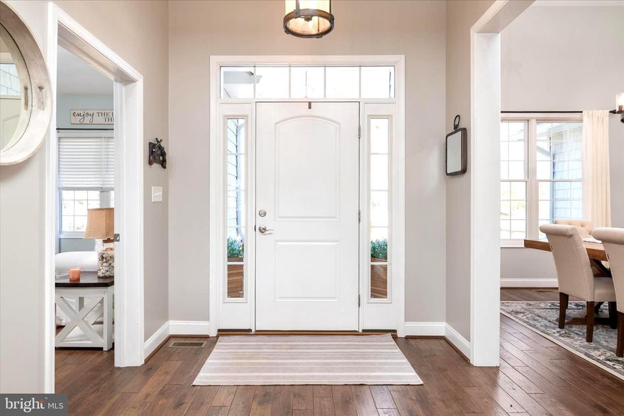 NO SHOWINGS UNTIL SATURDAY, MARCH 21, 2026  -- Private Waterfront Estate on Main Creek | 2.5 Acres | 125 Ft Shoreline--priced below appraised value!!

Tucked well off the main road on 2.5 private acres, this exceptional waterfront estate offers 125 feet of riprapped shoreline along the protected waters of Main Creek — a coveted setting that delivers calm, highly usable water while still providing direct access to Bodkin Creek and the Chesapeake Bay. With approximately 8 feet of mean low water depth, the property is ideally suited for serious boating and effortless everyday waterfront living.

The private pier is built for the boating enthusiast, featuring two 15,000-lb boat lifts, two jet ski lifts, and a wide 6-foot pier — a turnkey waterfront setup already in place. Stamped concrete walkways wind through the property, leading to a stamped patio with built-in firepit, creating the perfect setting for evenings by the water.

Built in 2018 and offering nearly 7,000 square feet of living space, the home combines modern construction with thoughtful design and generous proportions throughout. The primary suite is a true retreat, with sweeping water views visible right from the bed and a private balcony perfect for morning coffee overlooking the creek. The spa-inspired primary bath and expansive walk-in closet elevate the suite even further. A guest suite also enjoys beautiful open water views.

Additional features include an oversized three-car garage with heating and air conditioning, continuous hot water system, water filtration and conditioning, two-zone HVAC with a dedicated primary suite zone, and a full lower level with extensive storage and bathroom rough-in--in addition to the finished area with a full bath in place.

The fully paved quarter-mile driveway enhances the estate feel as it leads to the home. A substantial detached outbuilding with electricity, reinforced flooring, and drive-up ramp is currently used for golf cart storage but was constructed to support small vehicle weight, offering excellent potential as a workshop, studio, or additional storage space.

With protected water, expansive acreage, and extensive waterfront infrastructure already in place, this property offers a rare opportunity for private Chesapeake Bay lifestyle living.
No HOA