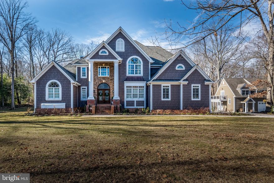 This Annapolis retreat situated in a wonderful neighborhood, within minutes of Historic Annapolis, the Village of West Annapolis, the Navy Stadium & Academy, shopping, the Severn River and more.  Fantastic convenience and yet, one of the largest available estate lots in the area for privacy.  Over 10,000 square feet of finished space between the main home and the guest house.  The lower level was also designed as a fully functioning residence for visiting family members.  Income potential with the guest house or perfect for aging parents, college kids, or a nanny.  Backyard has plans drawn for a pool and pool house.  Text or email Listing Agent Tim to schedule a showing.