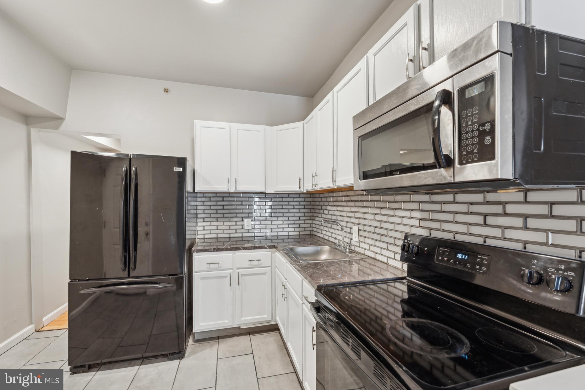 SELLERS ARE OFFERING $20,000 IN SELLER ASSIST!! Use it toward closing costs, an interest rate buy-down, or even repairs and updates to make this home your own! Welcome to 1615 W. Westmoreland Street – a renovated legal triplex located in a prime location, just blocks from Temple Hospital. Whether you're an investor or an aspiring homeowner looking to house hack, this property offers a winning combination of modern updates and long-term rental appeal. Two spacious 2-bedroom units on the first and second floors, including a vacant second-floor unit, ideal for an owner-occupant or additional rental income. One cozy 1-bedroom unit on the third floor with long-term tenants. Each unit boasts updated flooring, sleek kitchens with stainless steel appliances, and the convenience of an in-unit washer/dryer in the first and third floor units. A full unfinished basement offers storage or potential for future upgrades. Separate meters and utilities ensure easy management and tenant responsibility. Renovated and ready to go, this triplex minimizes upfront costs and maintenance headaches. Move into the vacant unit and let your tenants help pay the mortgage, or rent all three units for maximum income potential. Located near Temple Hospital, this property appeals to medical professionals, students, and staff, ensuring a consistent pool of potential tenants. Whether you're building your portfolio or looking to offset your living expenses, 1615 W. Westmoreland Street is the opportunity you've been waiting for. Schedule a showing today!