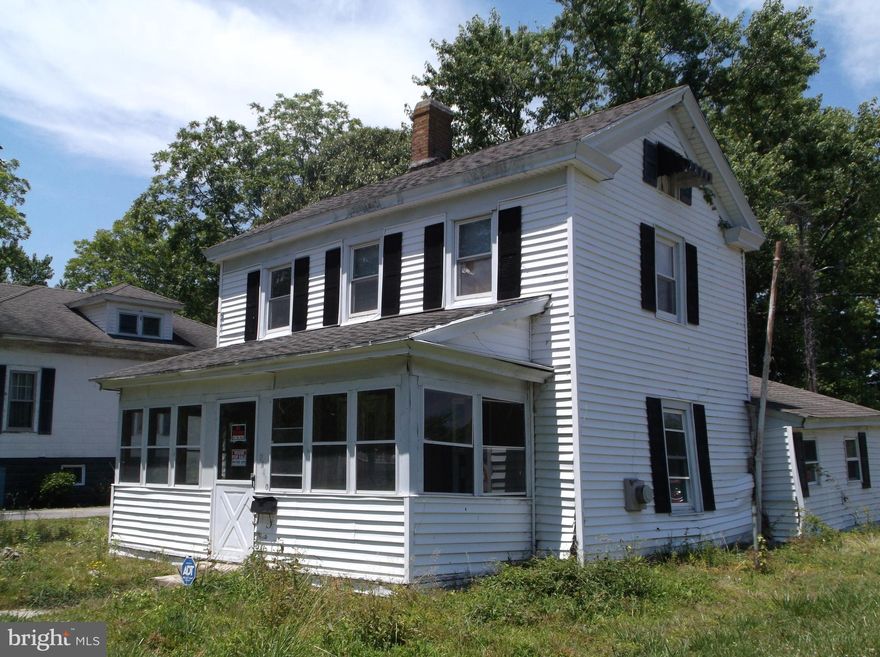 Lot with public water and sewer located outside city limits of Crisfield.  Dwelling on property is of no value, and is in VERY poor condition, with structural issues.