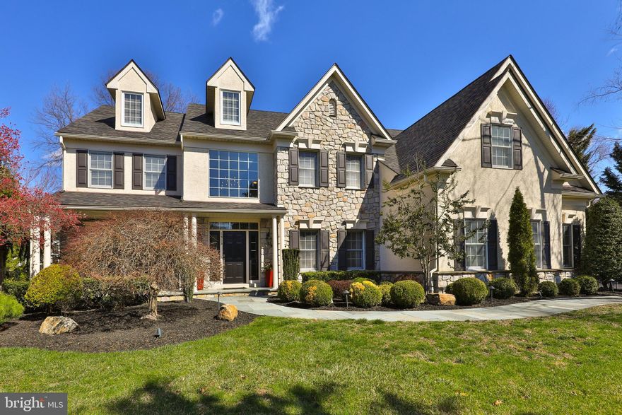 Welcome to perfection! This stunning, move-in-ready home nestled on a beautiful lot, is
in Lower Gwynedd’s sought-after Cedar Hill Estates. From its impressive curb appeal to
its thoughtful design and professional finishes, this home will steal your heart.
A flagstone walkway and front porch leads you to the home's entrance. Inside, an
elegant, curved hardwood staircase and site-finished hardwood floors that run
throughout the first and second-floor hallway set the tone. To the right is a spacious
office, and to the left, a living room that conveniently flows into the dining room, is
separated by French style pocket doors.
At the heart of the home is the chef’s kitchen, featuring cream cabinetry, a center island,
granite countertops, stainless-steel appliances, and a pantry. New Anderson doors open
to a lovely, landscaped patio and yard. The kitchen is open to a dramatic two-
story family room with a natural stone gas fireplace, wet bar, and dramatic wall of
windows (professionally tinted for UV protection). The first floor also includes a powder
room, laundry/mud room, and access to the oversized three-bay garage.
Upstairs, the primary suite offers a coffered ceiling, a sitting room, a massive walk-in
closet, and a stunning new bathroom with heated floors. Three additional bedrooms,
one en-suite, all feature walk-in closets. A third full bath and linen closet complete the
second floor.
The finished lower level includes a large recreation room with a kitchenette, a full bath,
and two versatile rooms (gym, office, guest room, or media room), plus a wall of closets
and a storage area with Bilko doors.
Surrounded by one of the popular Lower Gwynedd Trails and conveniently located near
Springhouse Village, Whole Foods and Starbucks, English Village with Trader Joe’s,
Ambler, the Ambler YMCA, SEPTA train station, Rt 309, the PA Turnpike and so much
more. The icing on the cake? It is in the top ranked Wissahickon School District. This
home is a 10!