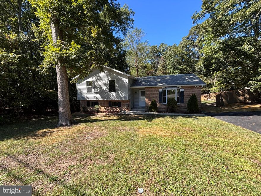 Priced To Sell Fast! Renovate & Resell, Buy & Hold, or Move-In and Build Some Sweat Equity. Rarely Available Brick Front Split Level, Spacious Kitchen, Spacious Bedrooms, Deck, Fenced Backyard, .50 Acre Lot, Storage Shed, Much More!! Tons of Potential!  Just Waiting For Your Personal Cosmetics and Updates to Make it Shine. Close to Schools, Shopping and Commuter Routes.  This Will Not Last! Sold As-Is.