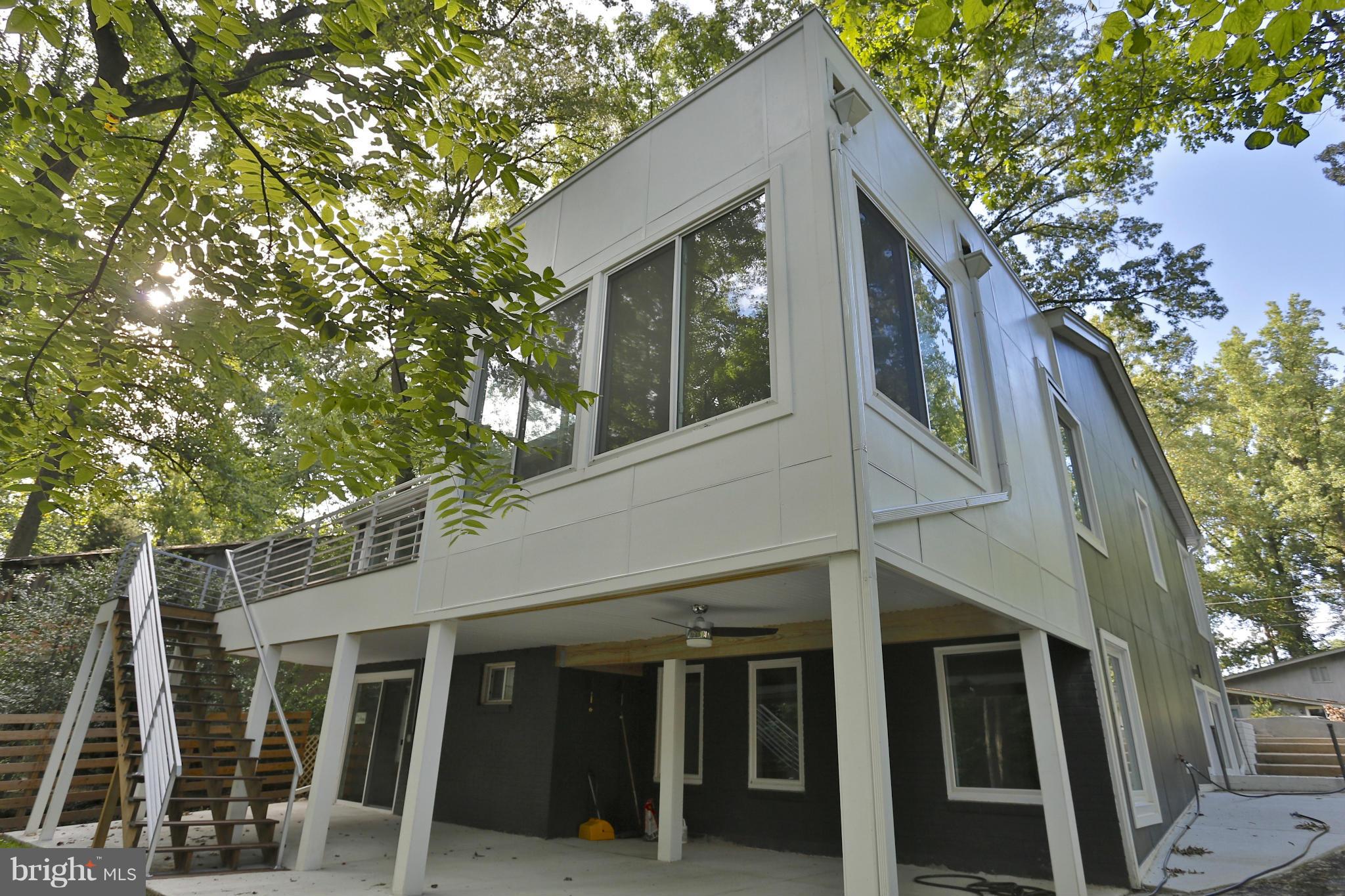 SEE PHOTOS !Totally renovated home in prime part of Bethesda close to DC, Beltway, C&O Canal & Potomac River. Designer sleek contemporary interior w/hi-end finishes, fixtures & appliances. Practically everything inside the home was replaces/renovated in 2016 along with home addition which seamlessly blends w/rest of home. Daylight basement has 2 BRs & 2 BAs. Great heated deck. Lot backs to trees