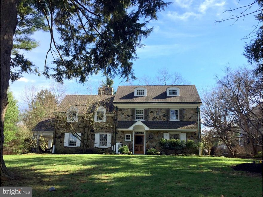 Don't miss out on this beautifully restored Wallace & Warner stone colonial in north side Bryn Mawr overlooking serene views of Ashbridge Park. It's a meticulous blend of extensive millwork, moldings, and gracious room sizes with today's modern amenities. A classic center hall foyer leads guests to a welcoming living room with handsome fireplace and French doors that take guests to a covered brick patio, perfect for al fresco dining and access to a private, flat lot. A simply charming family room with paneled millwork, custom shelving and powder room sits off the open kitchen and breakfast area. Both connect with the family's back entrance, 2nd powder room, and mudroom housing a 1st floor laundry. A country bib sink, De Rita white cabinetry, commercial quality appliances, convection/regular oven, stone flooring and a large, honed granite island with pendant lighting are just a few of the details that make this kitchen space the hub for family life and conversation. Designed for generous seating and ease of serving, the well lit dining room flows seamlessly to an outfitted butler's panty/bar with sink, marble counter top and custom cabinetry. Ascend to the second floor to a sumptuous master bedroom and luxurious spa-like marble, master bathroom with claw foot soaking tub and walk-in closet. Two additional beautifully appointed bedrooms share a Jack 'n Jill bathroom. A 4th bedroom completes the second floor. Two large, dormered, bedrooms (used separately or as an au pair suite) share a hall bath on the 3rd floor. A fabulous, tiled lower level offers a pool/ping pong game room, second family room and an office (formerly a massage room) with full bath, steam shower and an abundance of storage space.  Outside access leads to a backyard filled with flowering trees and bushes, flower beds, cedar framed vegetable gardens, patios and more. Additional features include: Award-winning Lower Merion Schools, 2?car attached garage, 4 parking, approx.1,500 sq.ft. in finished lower level space, Ashbridge Park tennis courts, walking/running trails, and playground. Walking distance to the train into Center City or NYC.  Minutes from Bryn Mawr shops, restaurants, Trader Joes, Whole Foods, Suburban Square, and King of Prussia Mall. Easy commute to the airport and major highways.