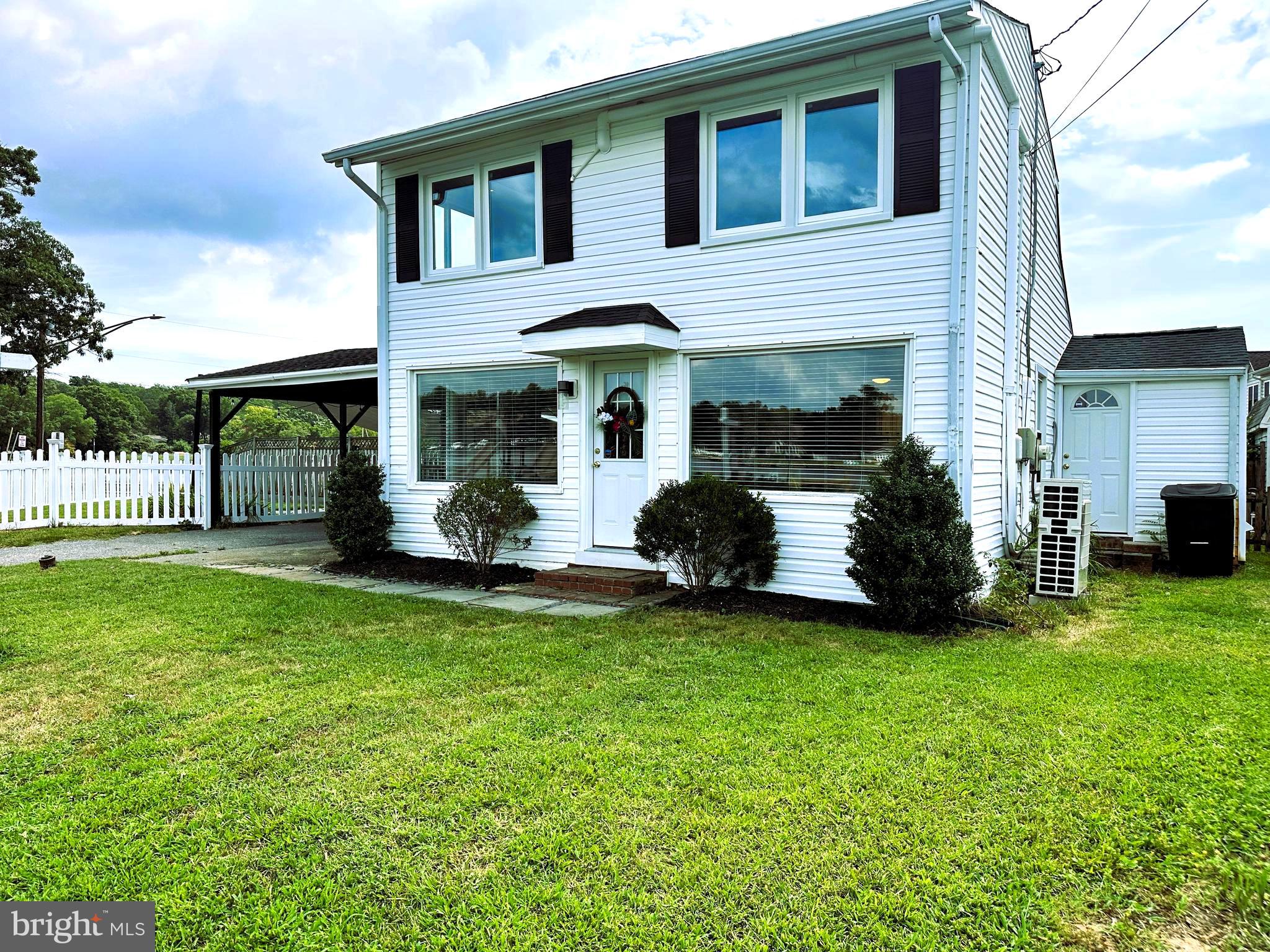 Welcome to 431 Shore Road, where there are Water Views Without Compromise!**
This charming 2-bedroom, 2-bath home offers stunning, unobstructed views of Almhouse Creek from every window. Featuring an updated kitchen and a bright, open-concept main level, this gem is nestled in a peaceful waterfront community with five beaches—one right across the street—a playground at your doorstep, and a nearby marina with piers for easy boat access. Best of all, **no flood insurance** and **no HOA** make this the perfect blend of carefree, affordable waterfront living. Don’t miss your chance to wake up to the water every day!