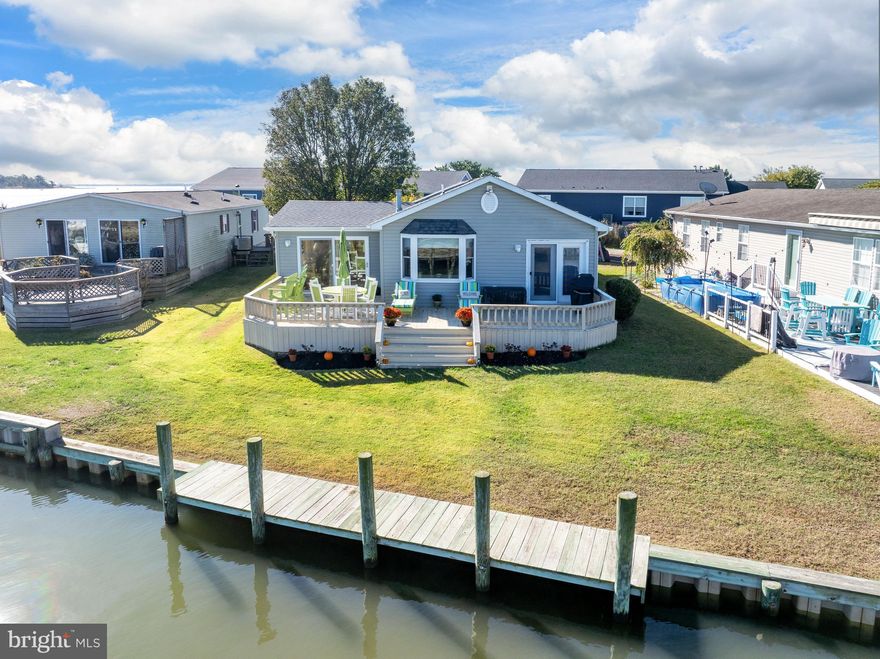 Waterfront Lifestyle in Massey’s Landing 

Recently Renovated Home | Private Dock | Low Lot Rent | Waterfront Retreat

Discover the perfect blend of coastal charm and modern comfort in this rare home tucked along the tranquil shores of Massey’s Landing — one of Delaware’s most desirable waterfront communities. This beautifully maintained property offers a lifestyle defined by boating, fishing, and relaxation, all from your own private backyard.

Enjoy direct access to the bay with a recently upgraded bulkhead and dock, perfect for your boat or paddleboard. The home’s 12x24 sunroom provides the ideal space to take in panoramic water views year-round, while the expansive decking extends your living area outdoors — perfect for morning coffee or sunset gatherings.

Inside, you’ll find 1,740 sq. ft. of single-level living featuring a comfortable open floor plan with a propane fireplace for cozy nights. HVAC is brand new as of June 2025 and roof was replaced just 3 years ago for added peace of mind. The block foundation offers exceptional stability and value, rare for the area.

Storage and convenience abound with a large oversized shed ideal for your golf cart, beach gear, and fishing supplies, plus an asphalt driveway with parking for up to 4 vehicles.

Massey’s Landing is more than a community — it’s a waterfront lifestyle. Spanning nearly 28 acres of open space, it offers open space, beautiful and coastal views and docks that allows for convenient waterfront living. With low lot rent, friendly neighbors, and your own private dock and bulkhead just off your deck, this is the perfect opportunity to embrace Delaware’s bayside beauty every day.