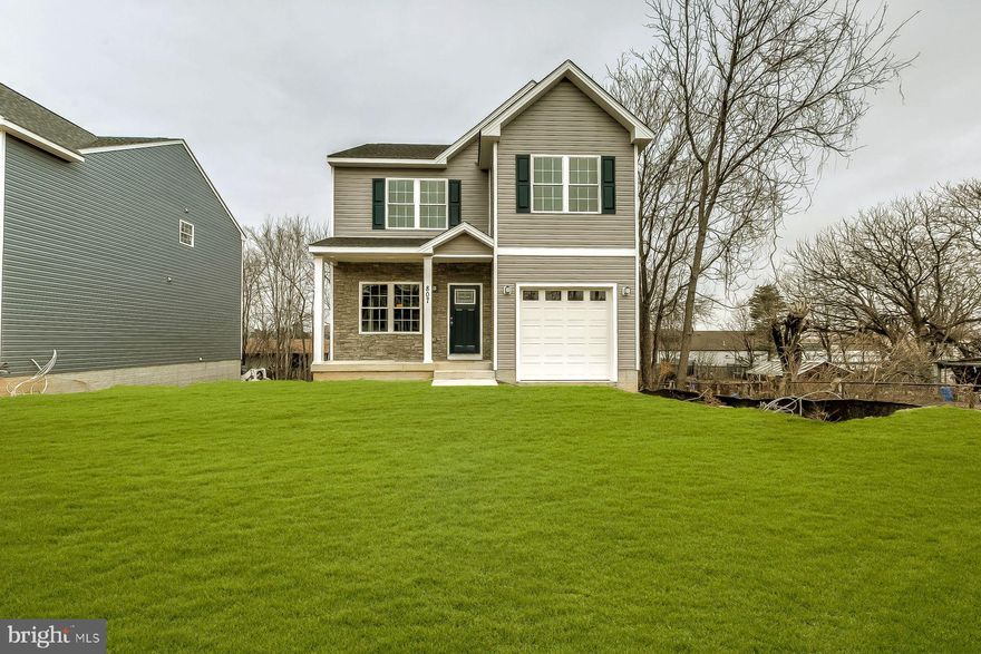 FINAL HOME SITE REMAINING! STUNNING SINGLE FAMILY BRAND NEW CONSTRUCTION WITH GARAGE. GLEAMING HARDWOODS CASCADE THROUGHOUT. ENJOY CUSTOM WHITE CABINETRY, IMPORTED TILE, UPGRADED TRIM AND PAINT PACKAGE, GORGEOUS COUNTERTOPS, SS APPLIANCES IN DESIGNER CHEF'S KITCHEN. OVER-SIZED FAMILY ROOM WITH GIGANTIC DINING SPACE - GREAT FOR ENTERTAINING. LOADS OF NATURAL LIGHT. SPACIOUS 4 BEDROOMS WITH 2.5 BATHROOMS. UNFINISHED BASEMENT - TONS OF STORAGE. LARGE OUTDOOR SPACE. CLOSE PROXIMITY TO LOCAL DINING, RETAIL SHOPPING, AND ALL MAJOR HIGHWAYS. 1 YEAR BUILDER SERVICE WARRANTY. SCHEDULE A PRIVATE TOUR TODAY.