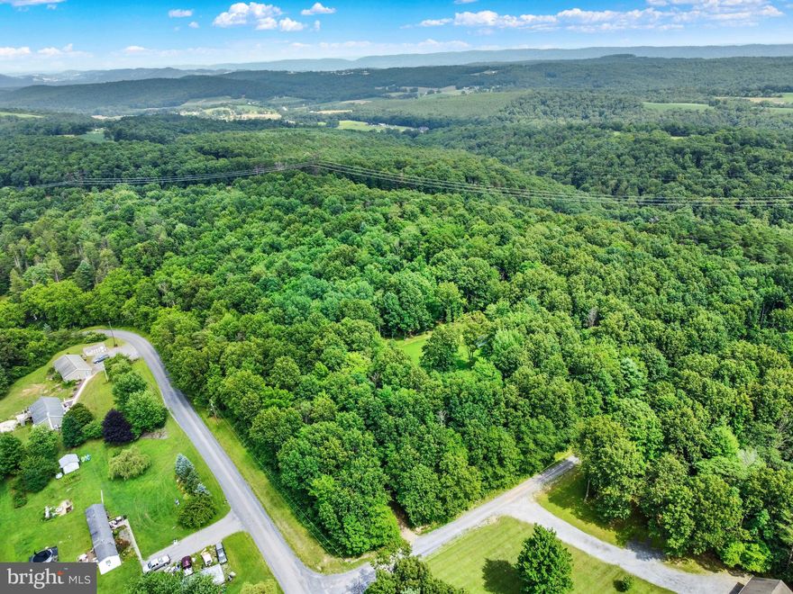 Over 16 wooded acres of sweetness.  Trails thru- out.  Cleared out for your future cabin.  Electric available on site.  Welcome to the village of Oriental.  Call the listing agent for all the details and a tour.