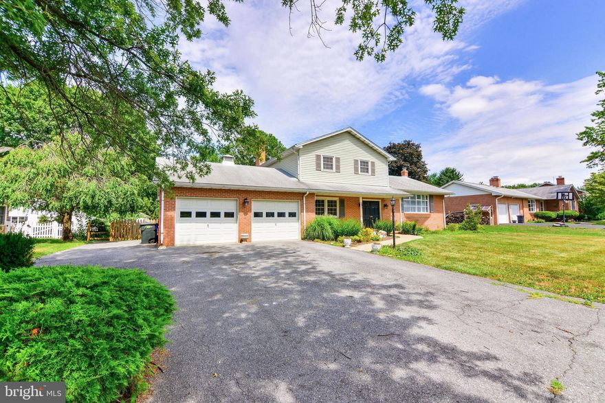 Major renovation in 2018 included installation of a dream kitchen and wood floors throughout. All the extra features that you want are included. A wood burning fireplace, fenced rear yard, over half an acre, oversized garage, 4th bedroom with built in shelving that could also serve as your new home office, sunroom, possible mudroom or overflow pantry, phew! This is an amazing property in brilliant Clover Hill. No city taxes and no HOA. Schedule your showing today.