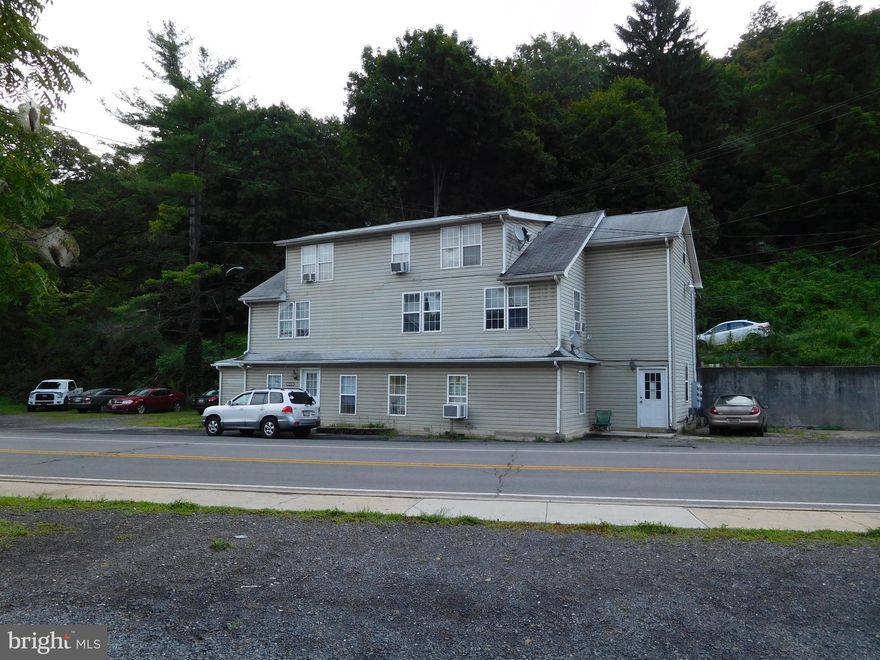 Attention Investors! Check out this stellar 5-unit moneymaker! Featuring two 1 Bedroom & three 2 bedroom apartments! Great rental history & ample parking!