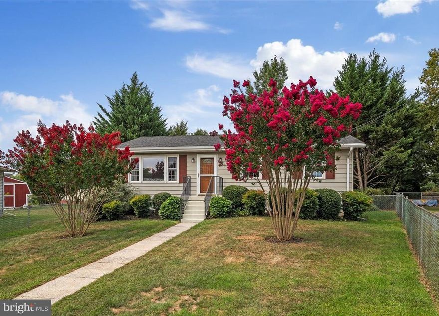 This adorable ranch home has been updated and is ready for you to move in! With its accessible main-level living, this house is an excellent spot to start out or perhaps retire to. And it's located at the end of a peaceful cul-de-sac close to downtown Charles Town. Saturday morning farmers markets, as well as the town's many restaurants and stores, are all accessible on foot. On the main level, there are three bedrooms along with a living room with an open layout, an updated kitchen/dining combo, and a full bathroom. The downstairs is completed with a large, finished recreation and family room. Off the recreation room, there is another finished bonus space that is now being utilized as a home office. An unfinished storage room completes the lower level of this home. The backyard space of this charming home is perfect for entertaining, with a brick patio area and a recently renovated deck that overlooks the sizable, secluded yard lined with trees.