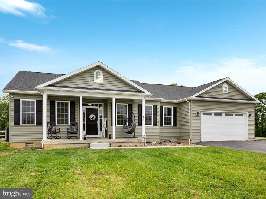 Welcome to 750 Swan Pond Road, a beautifully maintained 3-bedroom, 2-bath home in Martinsburg that blends comfort, quality, and thoughtful design. Situated on a 2-acre lot, this property offers lovely surroundings with plenty of room to enjoy the outdoors. 

Step inside to find luxury vinyl plank flooring, 9-foot ceilings, ceiling fans, and Pella windows that fill the home with natural light. The home features a desirable split-bedroom layout. The spacious primary suite is tucked away on one side and includes a private bath with a dual vanity. On the opposite side, you’ll find two generously sized bedrooms and a full hall bath, offering privacy and space for guests or family. 

The kitchen is the heart of the home, featuring granite countertops, a subway tile backsplash, stainless steel appliances, recessed lighting, barstool seating, and a walk-in pantry. A separate dining room provides the perfect setting for meals, while the large family room offers an inviting place to gather. 

Step outside to enjoy the covered front porch and fully fenced rear yard, ideal for outdoor relaxation or play. The attached two-car front-entry garage includes an insulated door, automatic opener, two remotes, and a keypad. A 24 by 32 detached garage is prepped for electricity, offering excellent potential for a workshop, hobby space, or additional storage. 

A whole-house Generac generator powered by a 500-gallon buried propane tank provides peace of mind with reliable backup power. This gorgeous home is ready for you to move right in. Schedule your tour today.