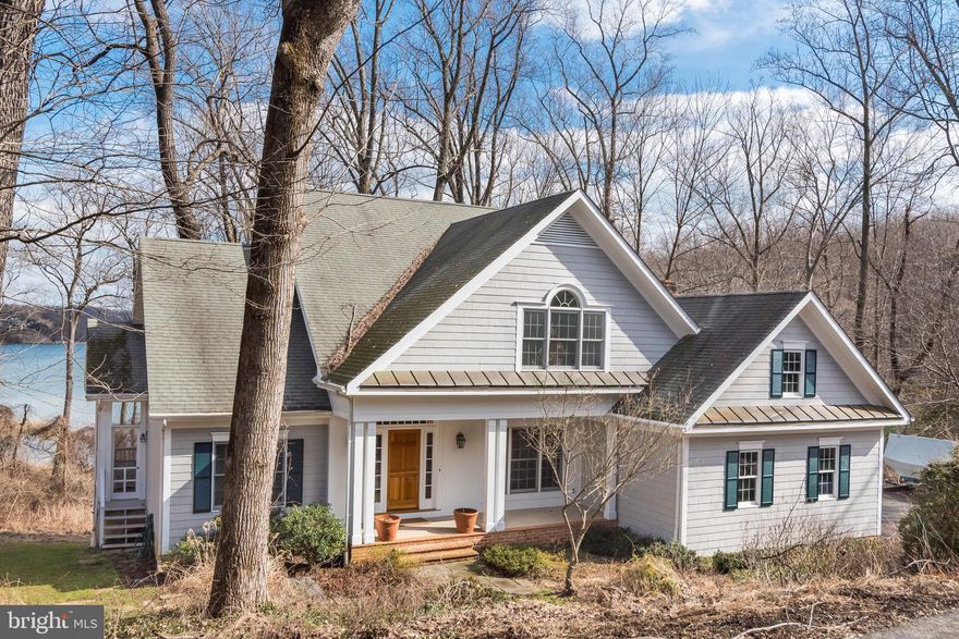 The most gorgeous & relaxing WATER VIEW of Clements Creek from  nearly every room! HOA is VOLUNTARY, but with membership every homeowner is entitled to a boat slip, pool, tennis/pickleball courts, stable! The best community amenities in the area for only $1250/year! Check out www.Saefern.org for all the community information & membership details.  Saefern is located conveniently to all major commuting roads, the Westfield Mall & downtown Historic Annapolis, City Dock & the US Naval Academy.  This home features beautiful wood floors (recently refinished), a main level bedroom en-suite. screened porch & expansive decking capturing the magnificent views.  The full basement offers all kinds of possibilities for future expansion...high ceilings & walk out sliders, large workbench & the partial crawl space has a cement floor.  WHEN SHOWING PLEASE REMOVE SHOES (NO HIGH HEELS) OR PUT ON BOOTIES BY FRONT DOOR...floors were just refinished.  No need to look any further...this is your year-round vacation retreat!!