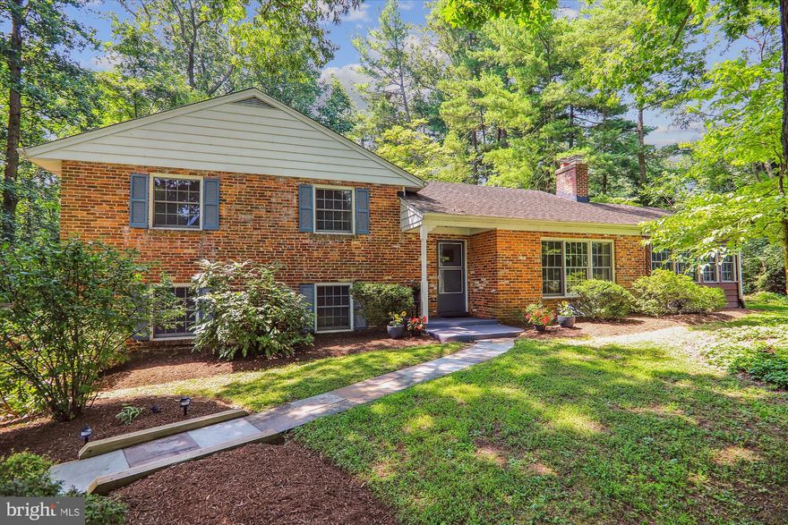 Imagine your light-filled spacious home where you look through windows to delightful vistas in this park-like setting.  The living room includes a wood-burning fireplace.  The lot is over half an acre and includes an enchanting and very private backyard. The home is well-situated on a small hill overlooking a serene, tree-lined no-through street. The home lends itself well to entertaining friends and family, as well as enjoyable hours of peaceful, quiet contentment. 

The home has broad appeal to many types of prospective buyers, including those who might wish to telework from the many possible home offices. Take a break via the two bike/hike trails that start only a couple of blocks away. The home is conveniently located near the ICC, for commuting and easy access eastward to BWI, the Chesapeake Bay or the beach, as well as points westward, north and south. It is about a 7-10 minute drive to the Glenmont metro and a 10-15 minute drive to the Shady Grove metro.  Brookside Gardens and the Trolley museum are only 2-3 miles away. The traffic light at the end of the street adds to the convenience, and makes  it easy for those who wish to walk to the nearby restaurants, shops, and gym facilities less than half a mile away. The Mid-County Recreation Center is less than a mile away and the Olney swim center is the next exit on the ICC. 

The kitchen includes a window above the sink overlooking the charming fenced-in backyard and a door accessing the patio, perfect for BBQs and easy entertaining.   All appliances are new within the last couple of years.  The gracious main floor provides an easy flow and amazing views throughout the kitchen, dining room, sun room, and living room.  The home has beautiful hardwood floors on the main and upper levels.  

The upper floor includes three bedrooms all with large closets, including a walk-in closet in the primary bedroom. There are two full bathrooms on this level, one adjoining the primary bedroom.  All bedrooms have gorgeous views of the park-like setting below.   

On the lower level (the third of the four levels), there is a third (beautifully remodeled) full bath and a large home office. There are French doors to the outside in this room, as well as a door to the garage. Also included on this level is the laundry area.

On the lowest level (the fourth of four levels) there is a large recreation room with windows that were enlarged to provide additional natural light, as well as a second study or guest room.  In the other area on this level there is additional storage space.  This home is a versatile gem!

SELLER WILL REVIEW OFFERS SUBMITTED BY NOON ON SUNDAY, AUGUST 13TH.