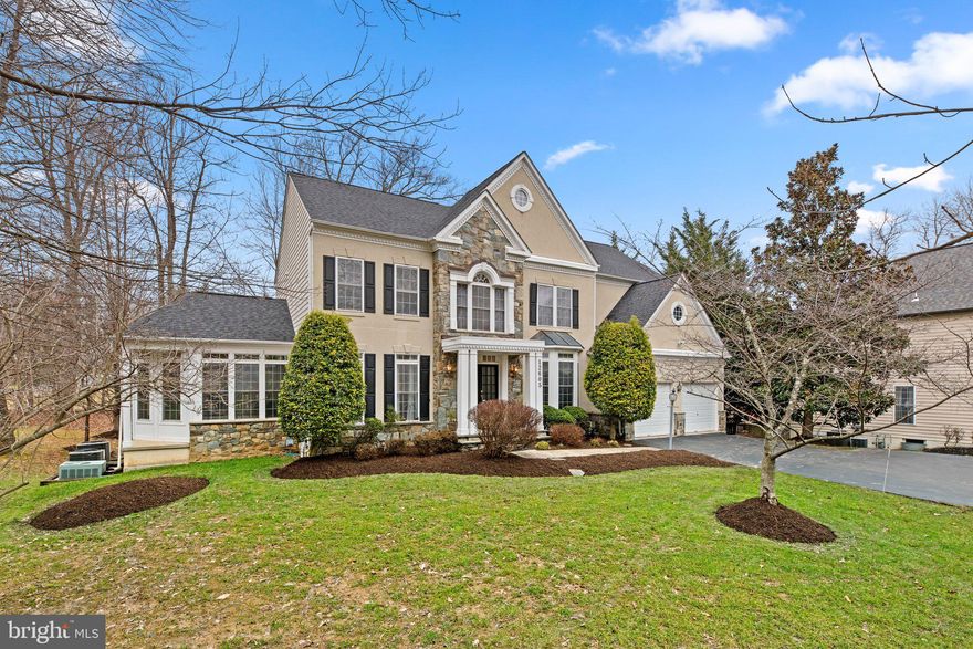 This beautiful 4 bedroom, 4.5 bath residence is tucked away on a cul-de-sac and boasts brand new carpeting and fresh paint throughout, creating a welcoming and move-in ready environment for its new owners. The grand scale floor plan is highlighted with soaring ceilings that elevate the overall atmosphere. Formal living room and formal dining room that is fit for hosting memorable dinner parties, with butler's pantry access and a kitchen that can be closed off for added privacy. Spacious & bright, the kitchen overlooks the rear deck & view of trees, proving a calming backdrop while cooking or enjoying meals.  The main level is designed for both work and relaxation, featuring a convenient office space and a welcoming family room with a cozy stone fireplace. The incredible sunroom, adorned with panoramic floor-to-ceiling windows, provides a breathtaking view of the surroundings, bringing the beauty of nature indoors. This space is perfect for enjoying the changing seasons in the utmost comfort. The primary bedroom suite is a true haven, occupying roughly half of the upstairs floor plan. The spaciousness is beyond compare, featuring a soaring cathedral ceiling, dual walk in closets, and a host of luxurious amenities. The primary bathroom features dual vanities, stall shower, a skylight that bathes the space in natural light, and a relaxing Jacuzzi tub create a spa-like retreat within the comfort of your own home. The home also includes generously sized secondary bedrooms, with two connected by a convenient Jack & Jill bath, and the third having access to the dual-entry hall bath. The lower level of this home offers an expansive finished walk-out basement with a recreation room, ample storage space, a guest room, a full bath, and a convenient kitchenette and bar. This space is perfect for entertaining guests or creating a cozy retreat for family gatherings. Fantastic Clarksburg location with easy access to commuter roads, schools, shopping, restaurants, and more.